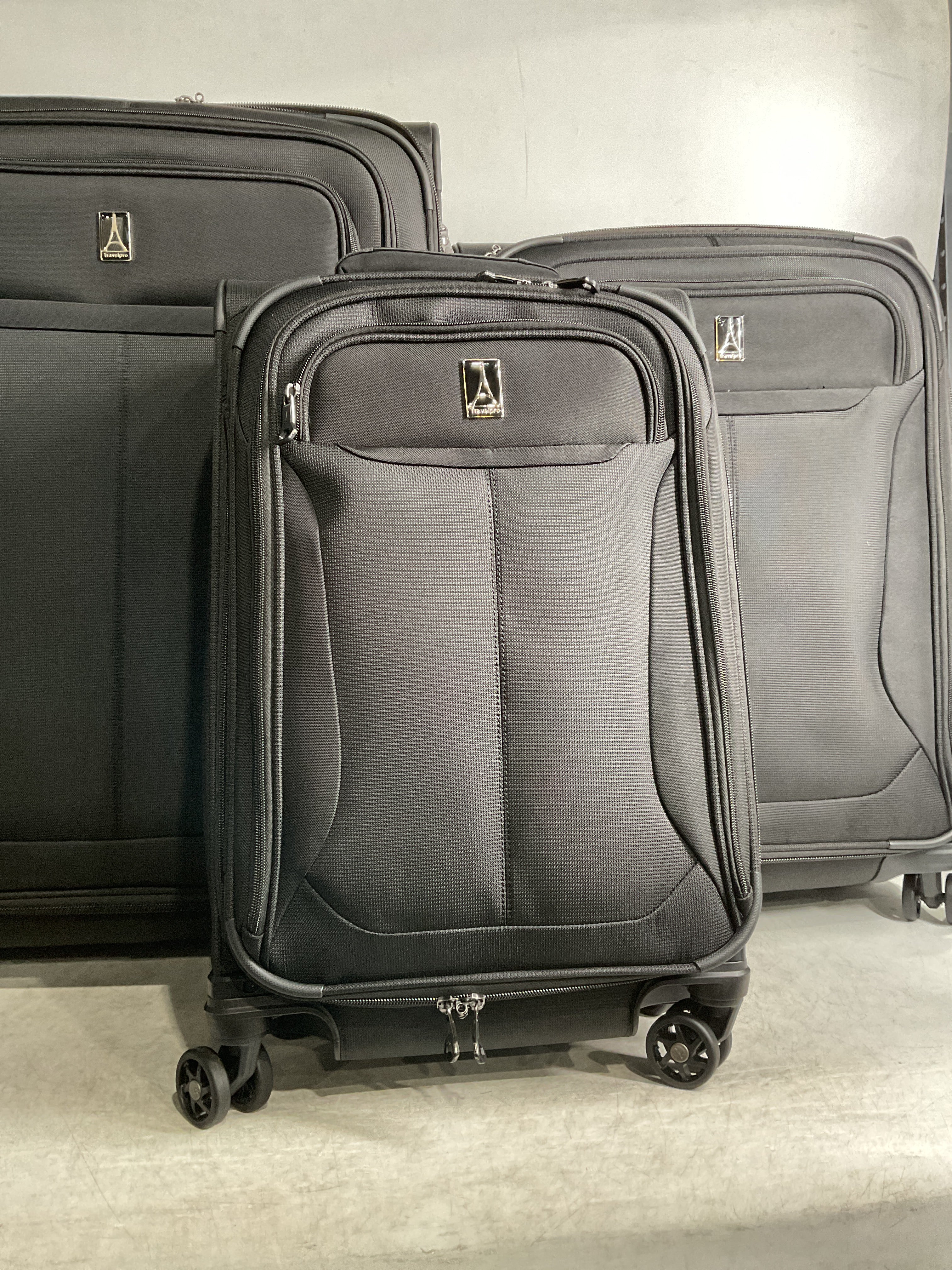 Travelpro Tourlite Softside Expandable Luggage with 4 Spinner Wheels, Lightweight Suitcase, Men and Women ( Black , 3-Piece Set (21/25/29) ) Black 3 Piece Set 21 25 29 U2