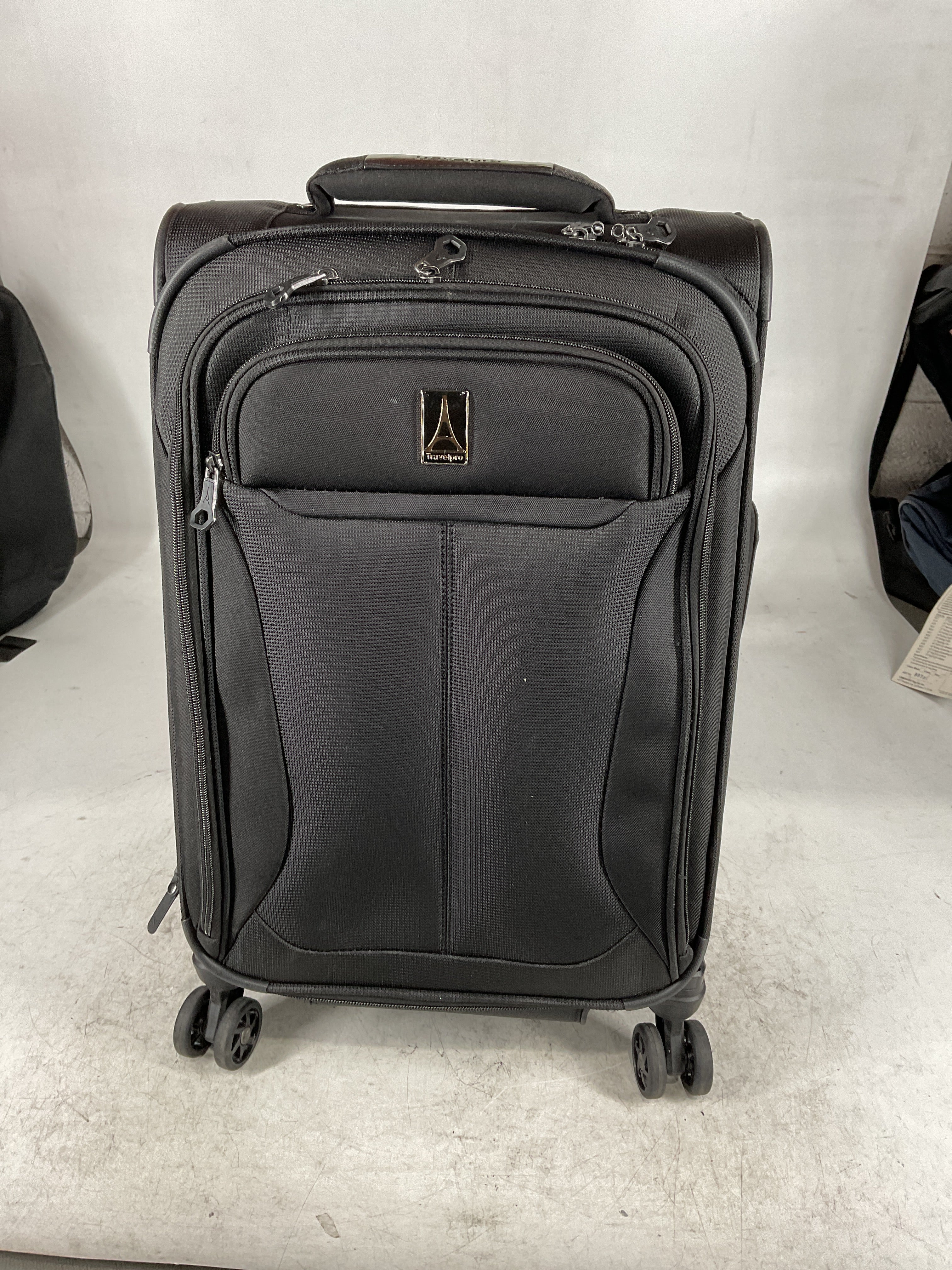Travelpro Tourlite Softside Expandable Luggage with 4 Spinner Wheels, Lightweight Suitcase, Men and Women Black Carry On 21 Inch U14