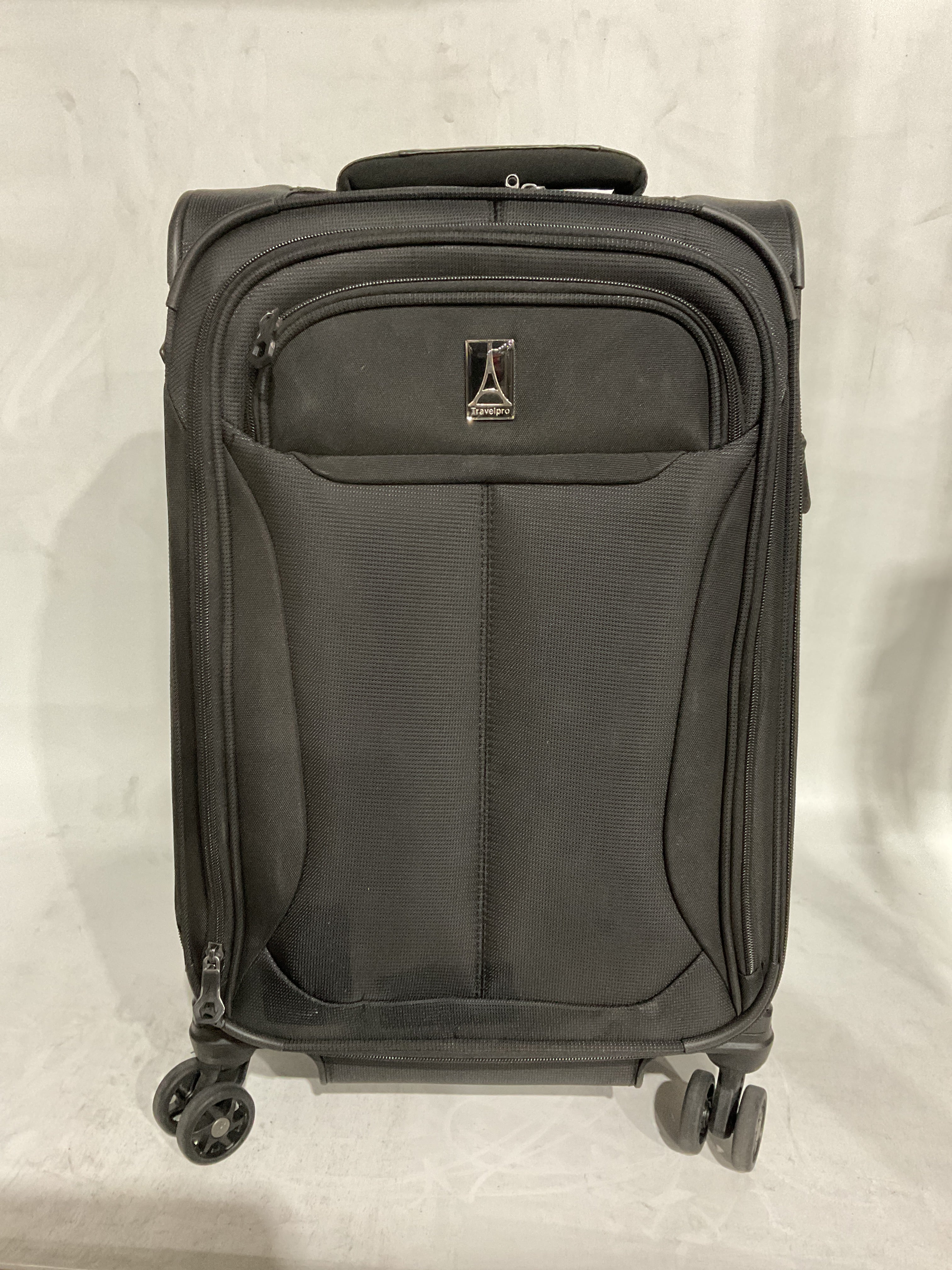 Travelpro Tourlite Softside Expandable Luggage with 4 Spinner Wheels, Lightweight Suitcase, Men and Women Black Carry On 21 Inch U16