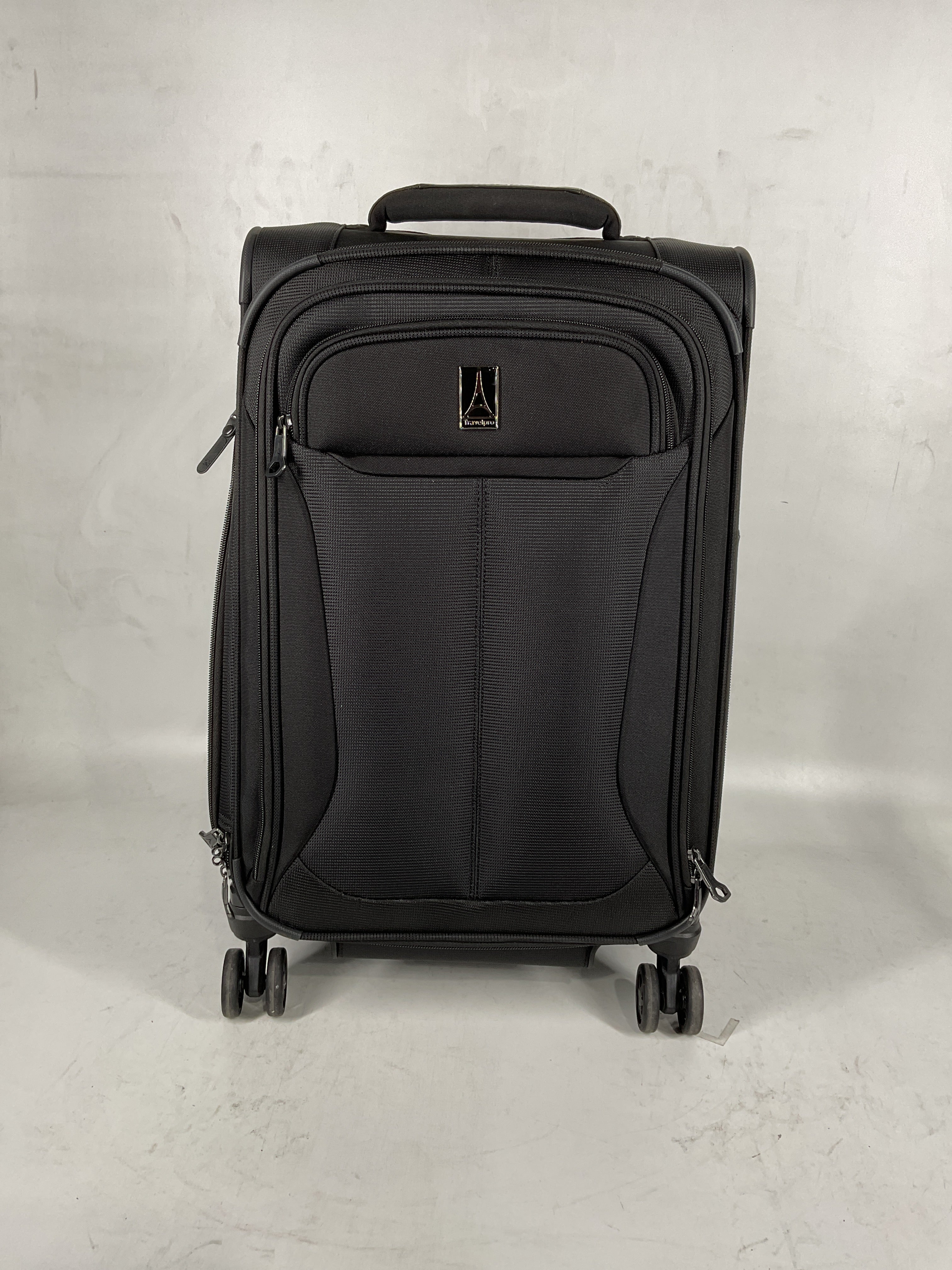 Travelpro Tourlite Softside Expandable Luggage with 4 Spinner Wheels, Lightweight Suitcase, Men and Women Black Carry On 21 Inch U19