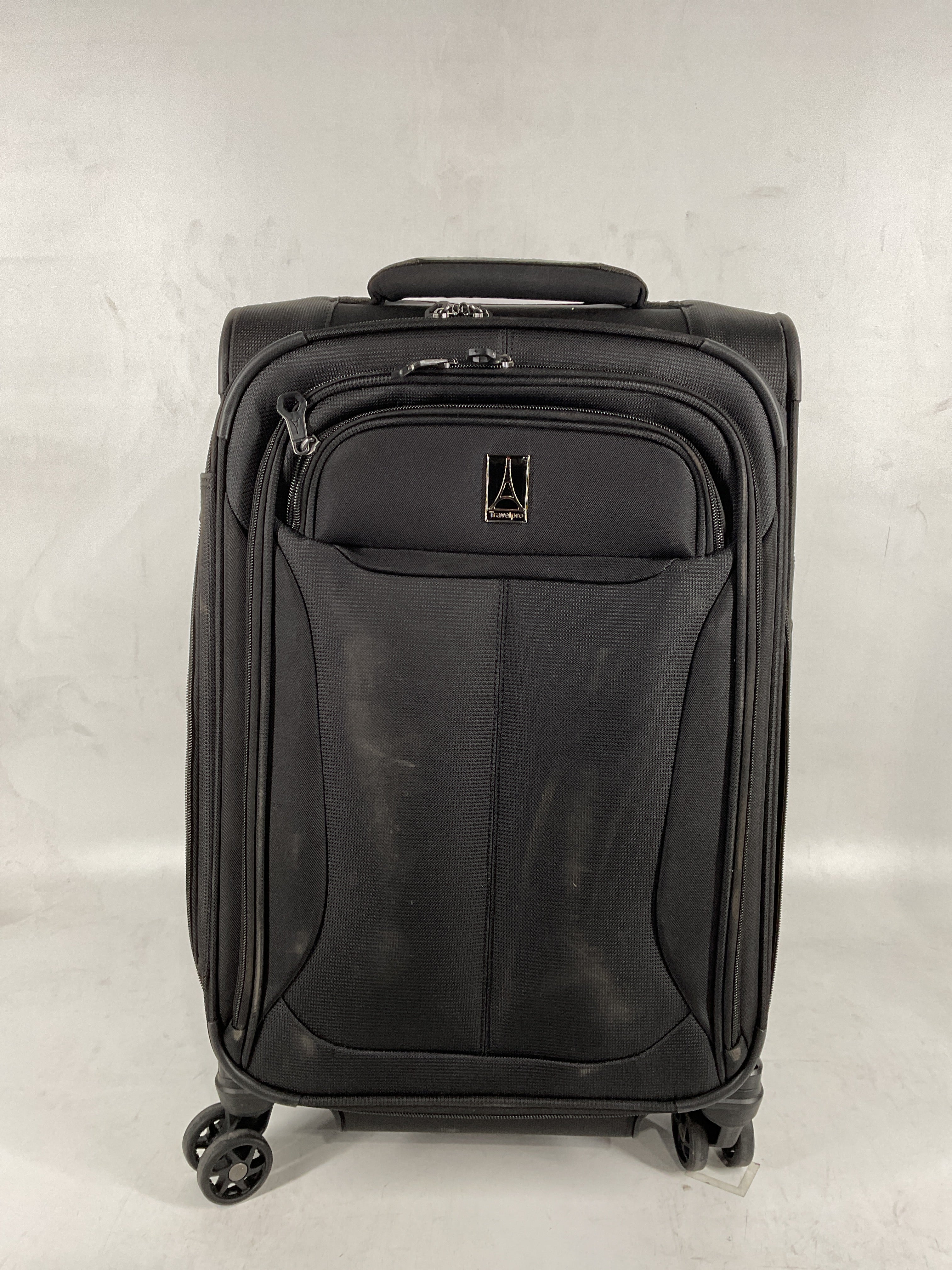 Travelpro Tourlite Softside Expandable Luggage with 4 Spinner Wheels, Lightweight Suitcase, Men and Women Black Carry On 21 Inch U21