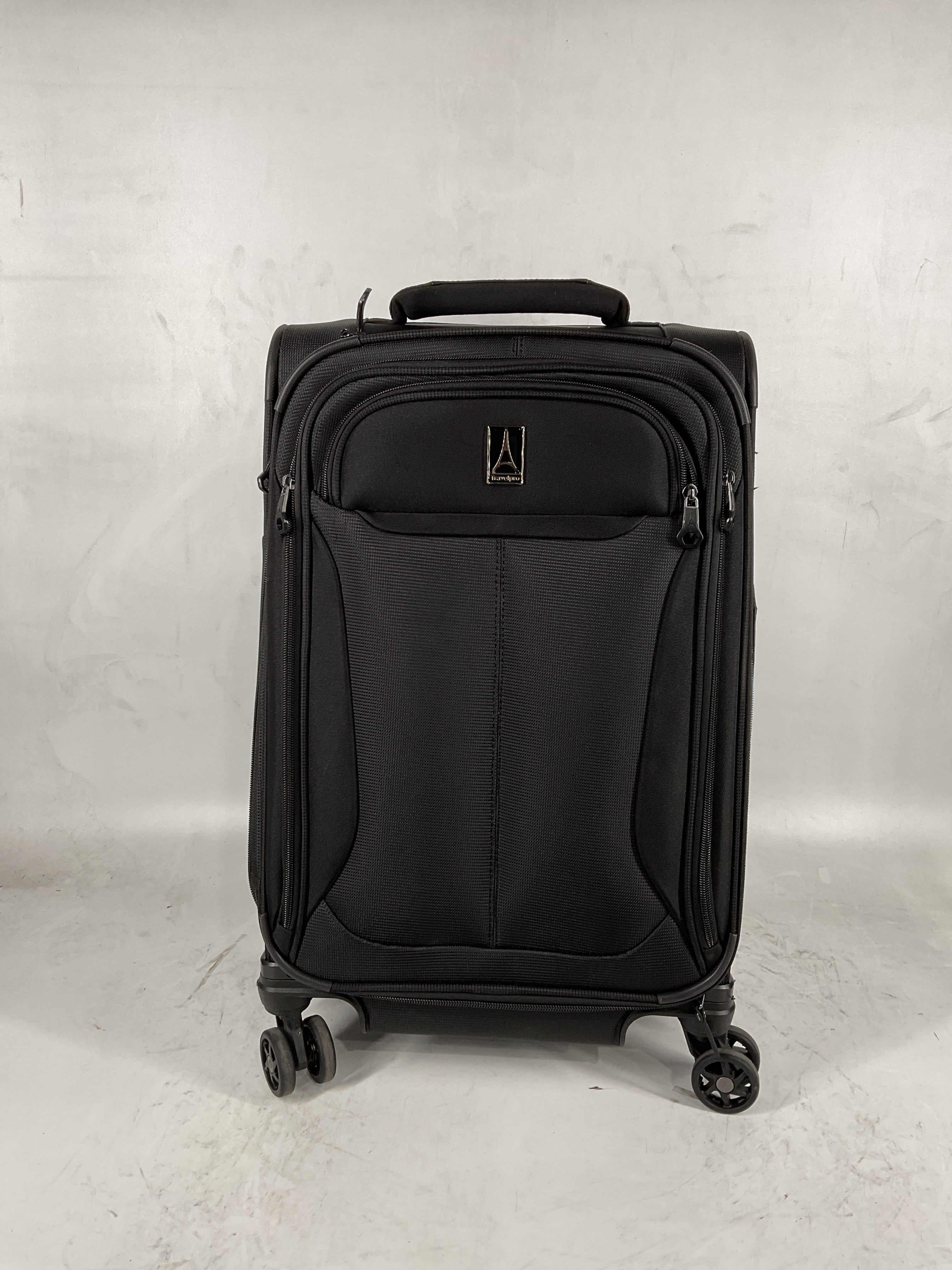 Travelpro Tourlite Softside Expandable Luggage with 4 Spinner Wheels, Lightweight Suitcase, Men and Women Black Carry On 21 Inch U23