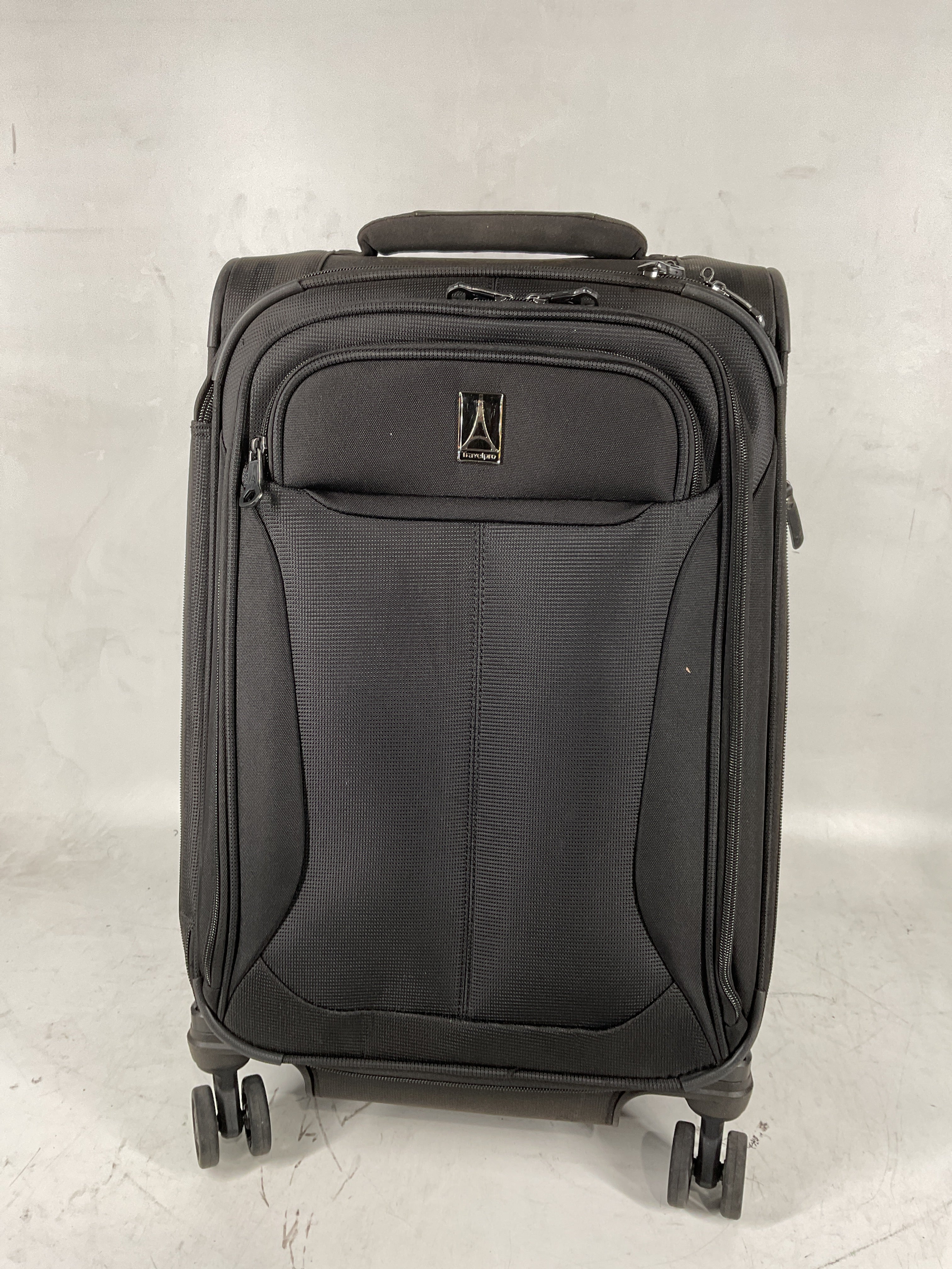 Travelpro Tourlite Softside Expandable Luggage with 4 Spinner Wheels, Lightweight Suitcase, Men and Women Black Carry On 21 Inch U25