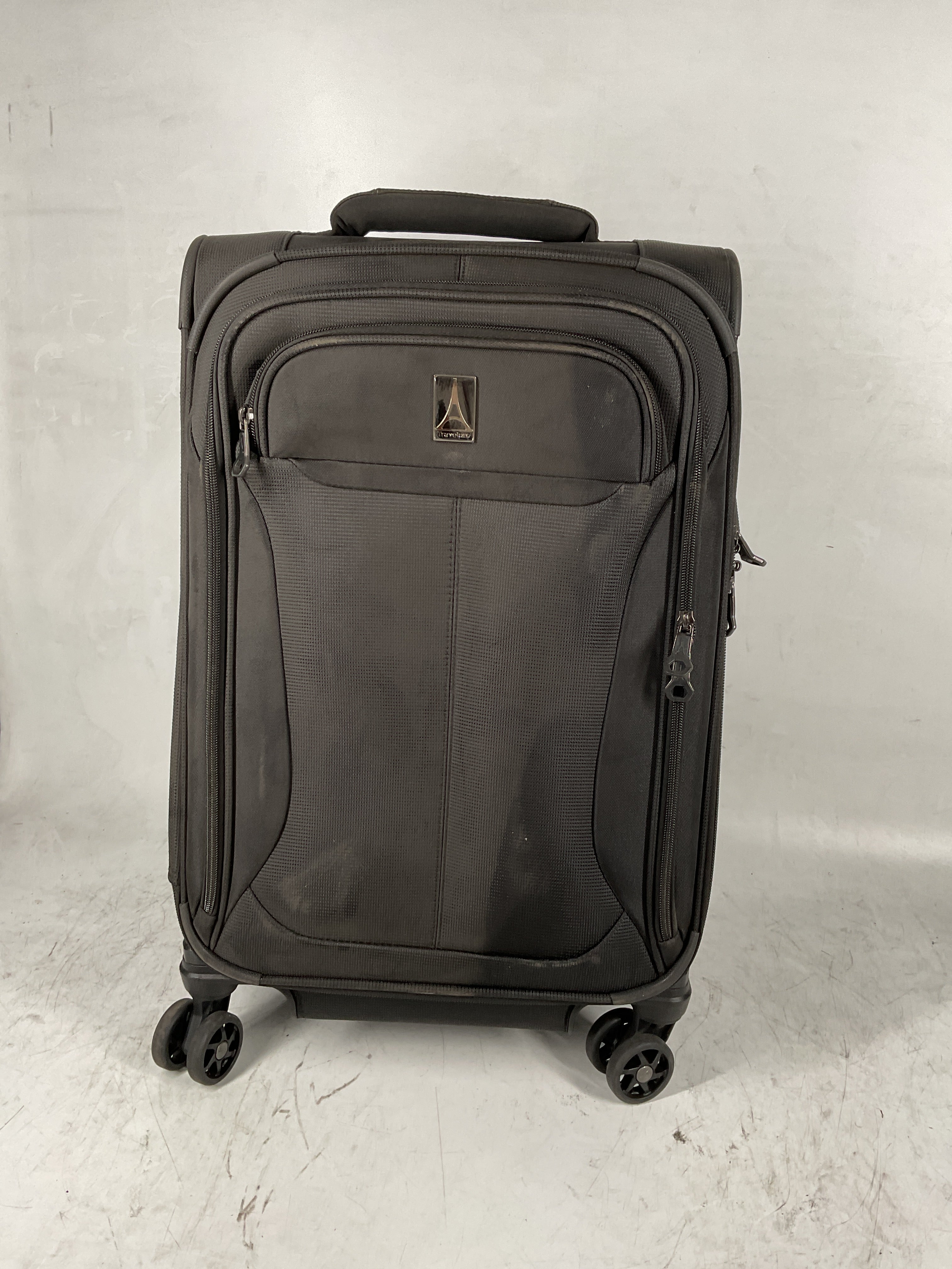 Travelpro Tourlite Softside Expandable Luggage with 4 Spinner Wheels, Lightweight Suitcase, Men and Women Black Carry On 21 Inch U29