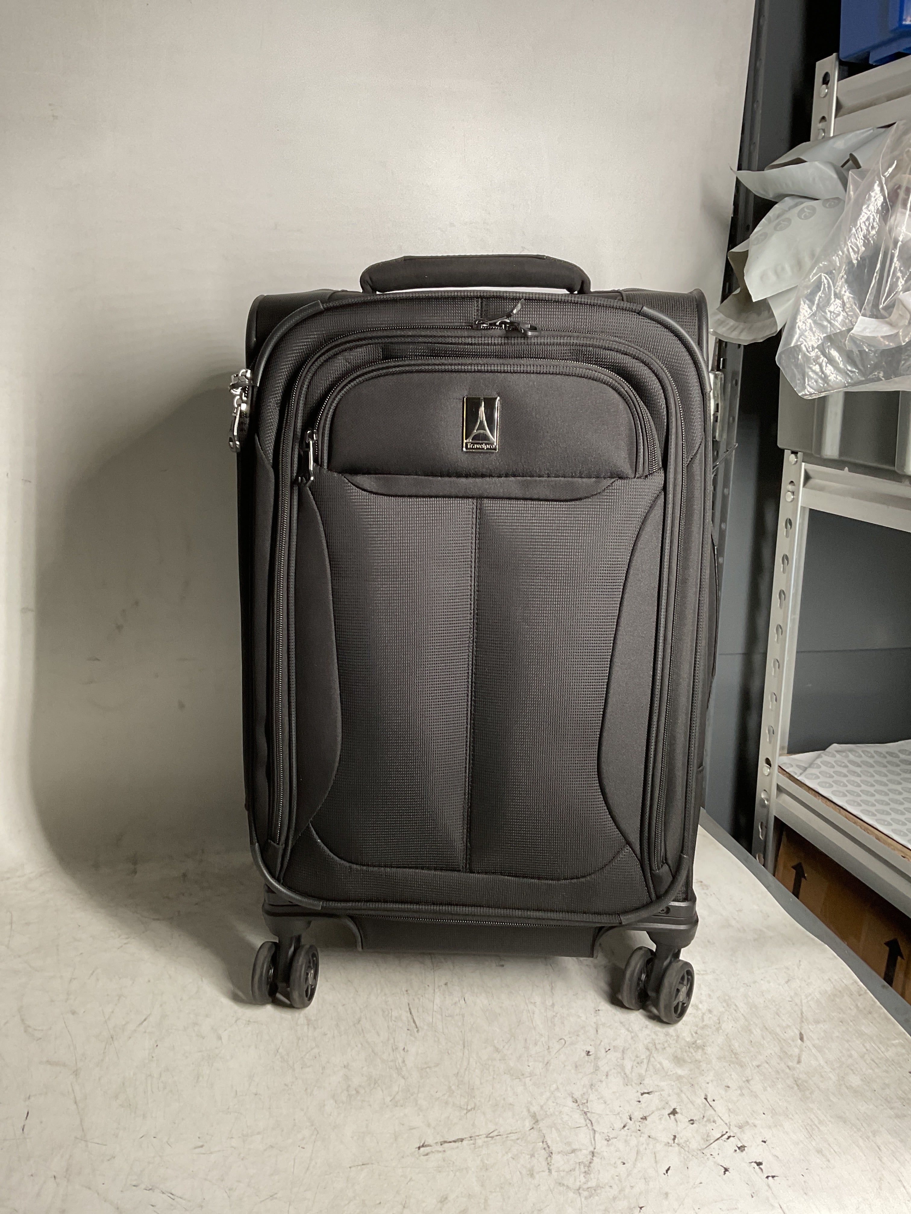 Travelpro Tourlite Softside Expandable Luggage with 4 Spinner Wheels, Lightweight Suitcase, Men and Women ( Black , Carry-On 21-Inch ) Black Carry On 21 Inch U43