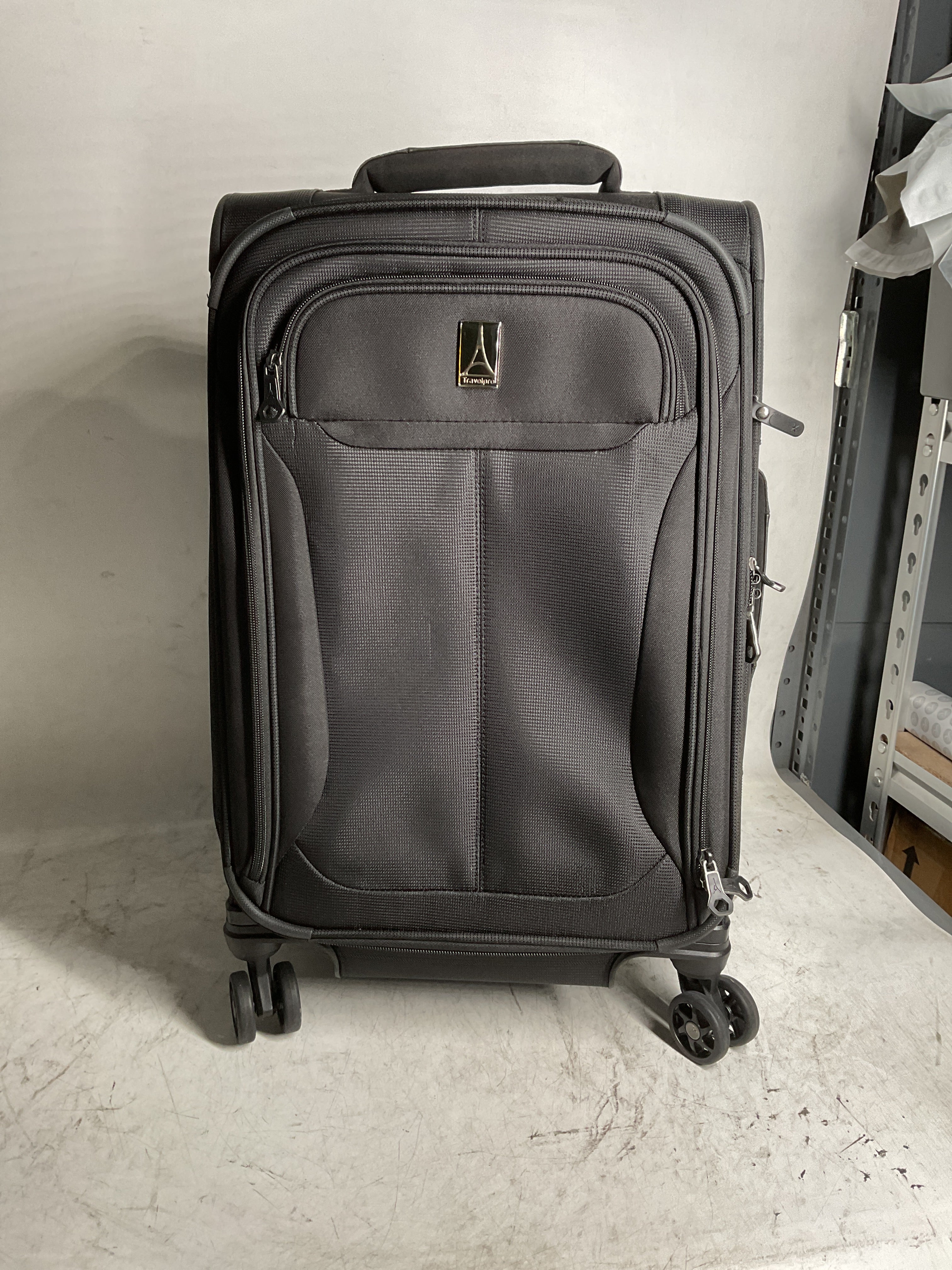 Travelpro Tourlite Softside Expandable Luggage with 4 Spinner Wheels, Lightweight Suitcase, Men and Women ( Black , Carry-On 21-Inch ) Black Carry On 21 Inch U44