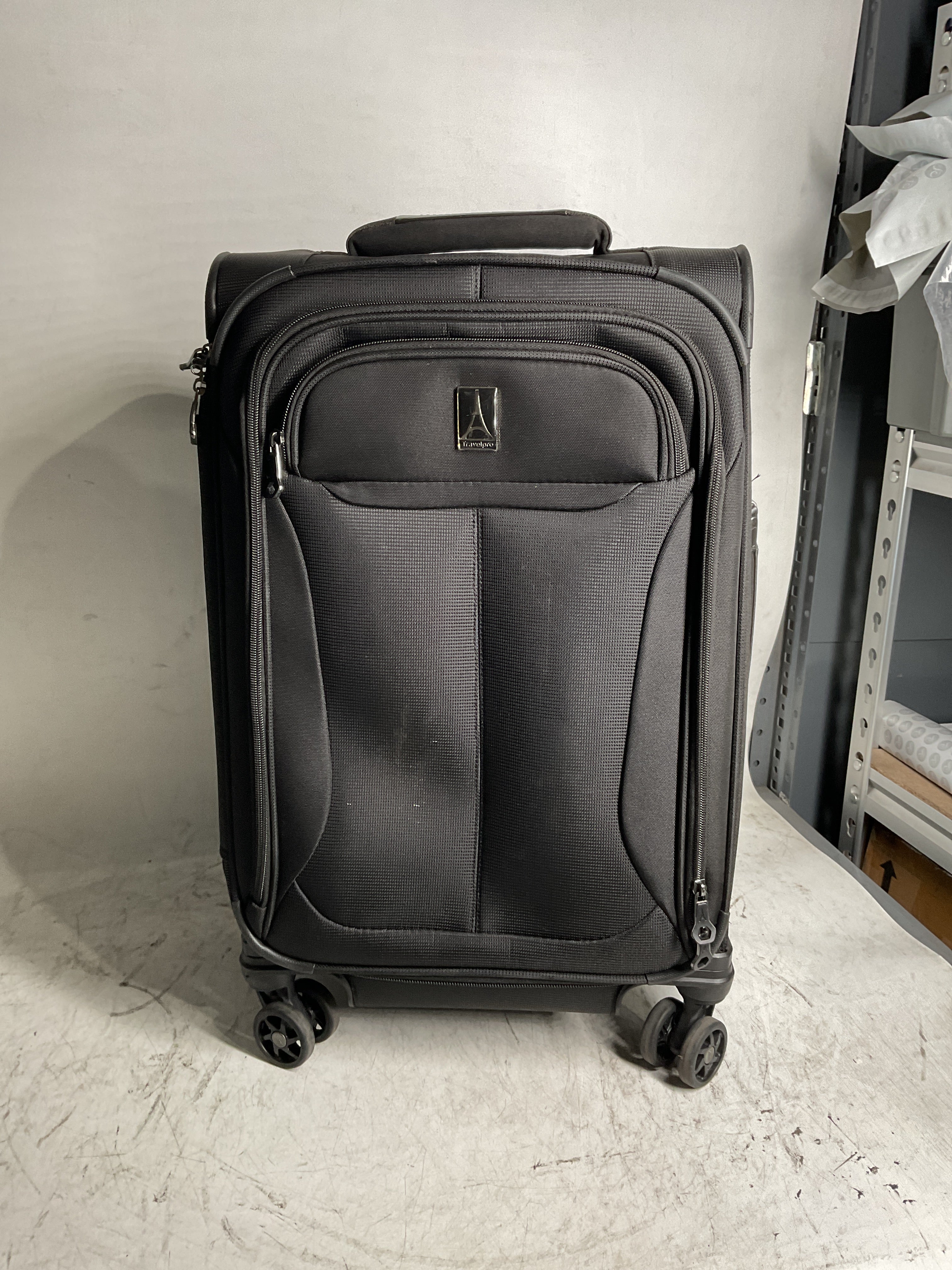 Travelpro Tourlite Softside Expandable Luggage with 4 Spinner Wheels, Lightweight Suitcase, Men and Women ( Black , Carry-On 21-Inch ) Black Carry On 21 Inch U45