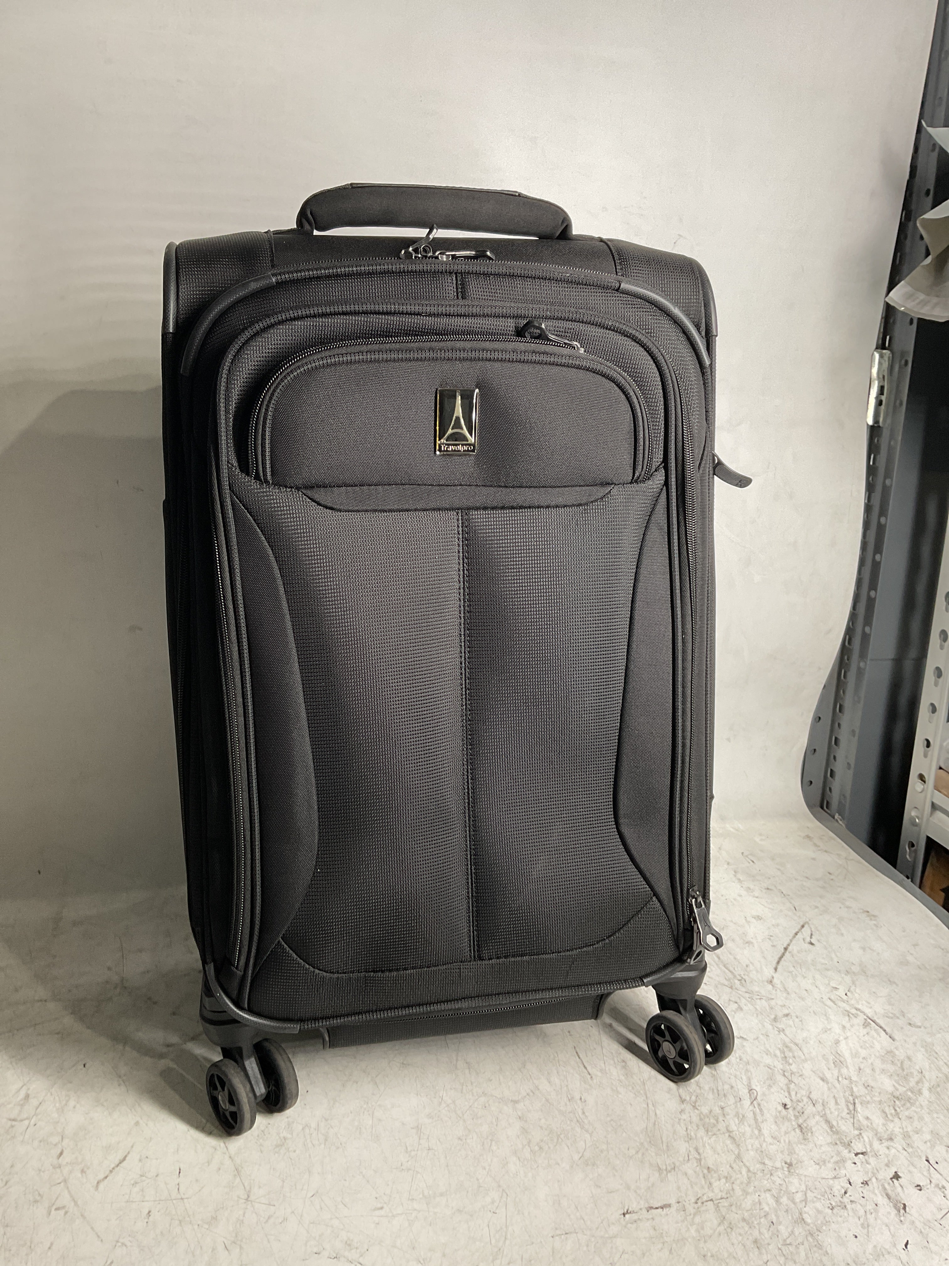 Travelpro Tourlite Softside Expandable Luggage with 4 Spinner Wheels, Lightweight Suitcase, Men and Women ( Black , Carry-On 21-Inch ) Black Carry On 21 Inch U46