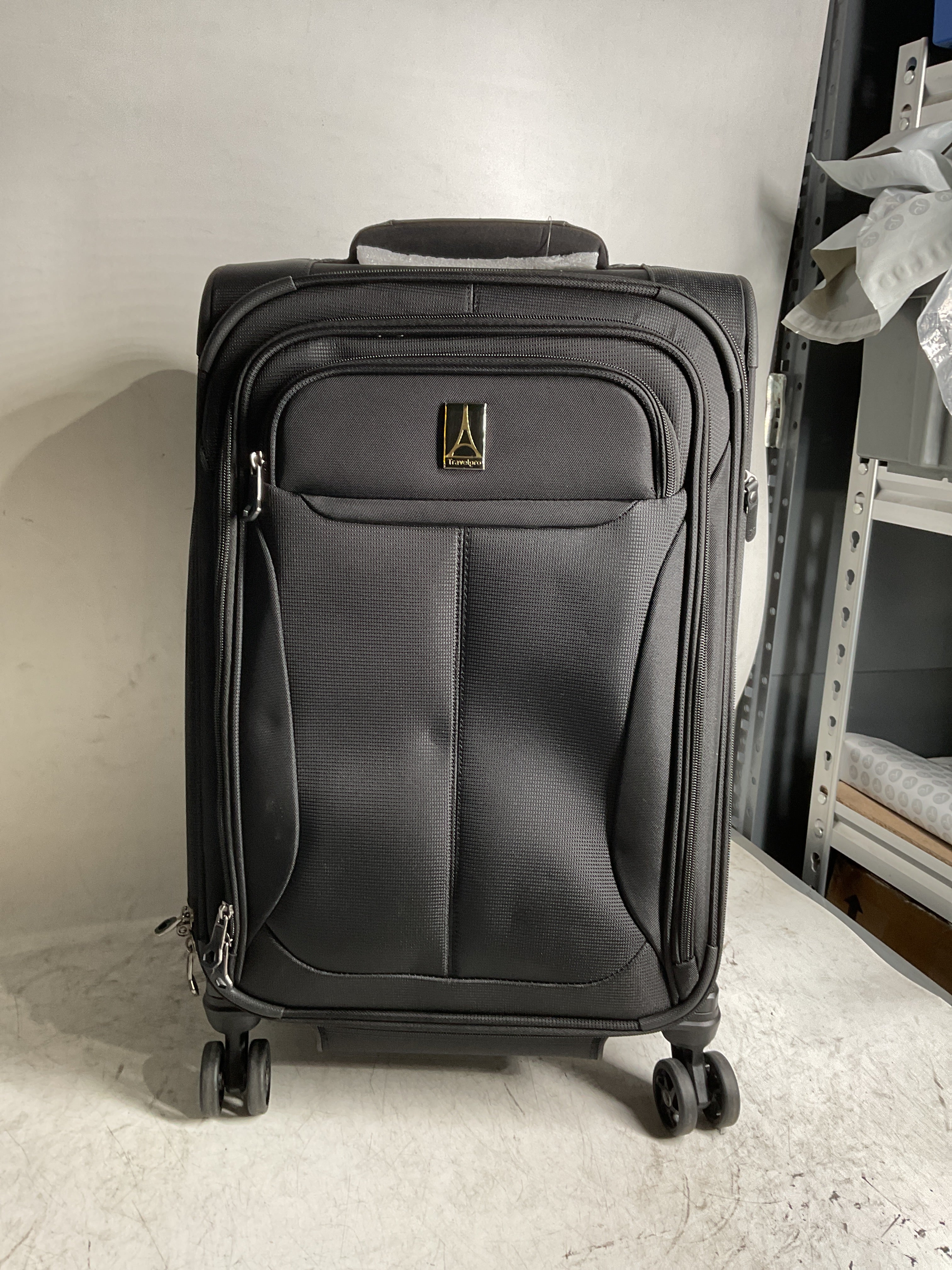 Travelpro Tourlite Softside Expandable Luggage with 4 Spinner Wheels, Lightweight Suitcase, Men and Women ( Black , Carry-On 21-Inch ) Black Carry On 21 Inch U47