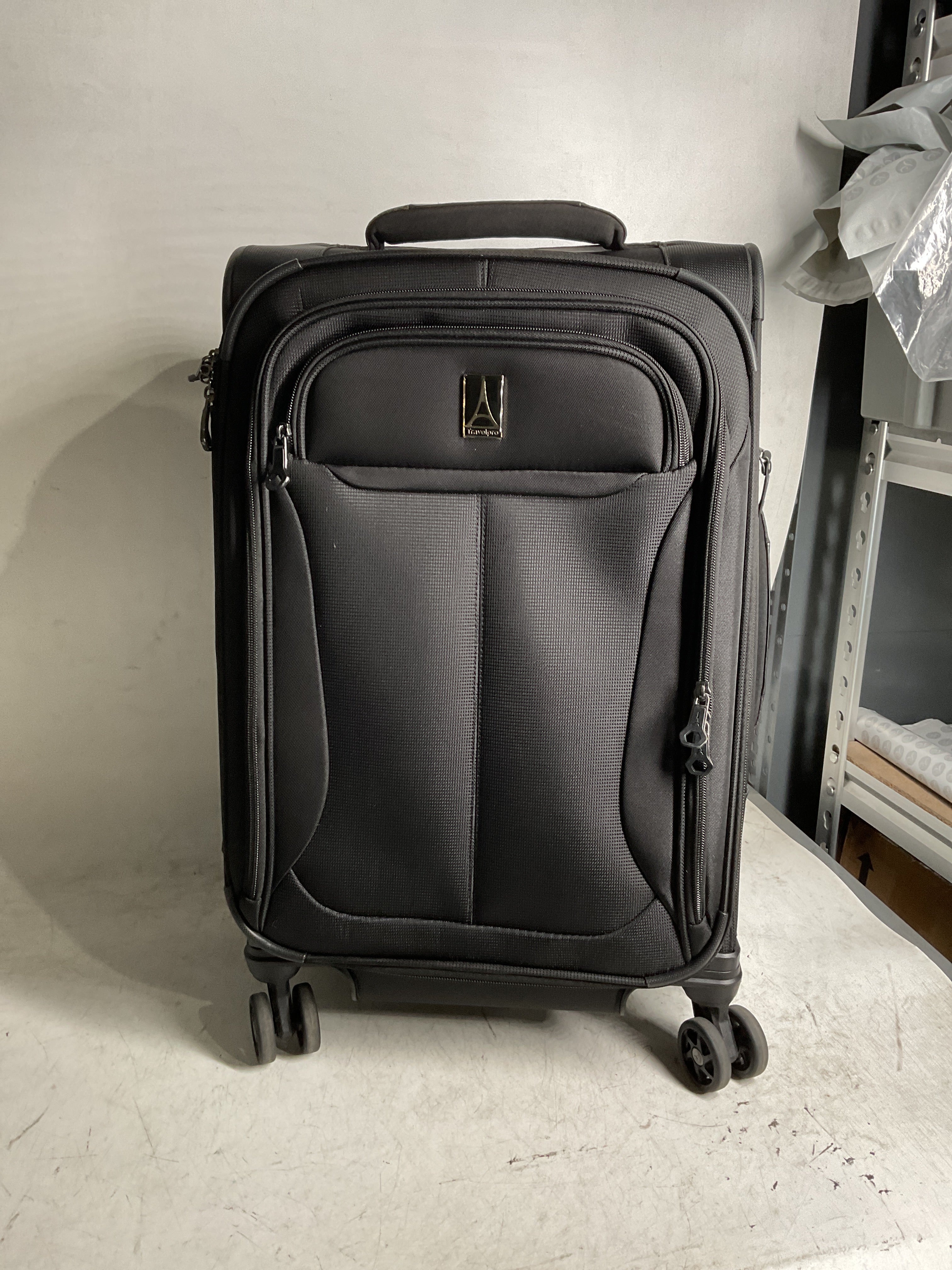 Travelpro Tourlite Softside Expandable Luggage with 4 Spinner Wheels, Lightweight Suitcase, Men and Women ( Black , Carry-On 21-Inch ) Black Carry On 21 Inch U48