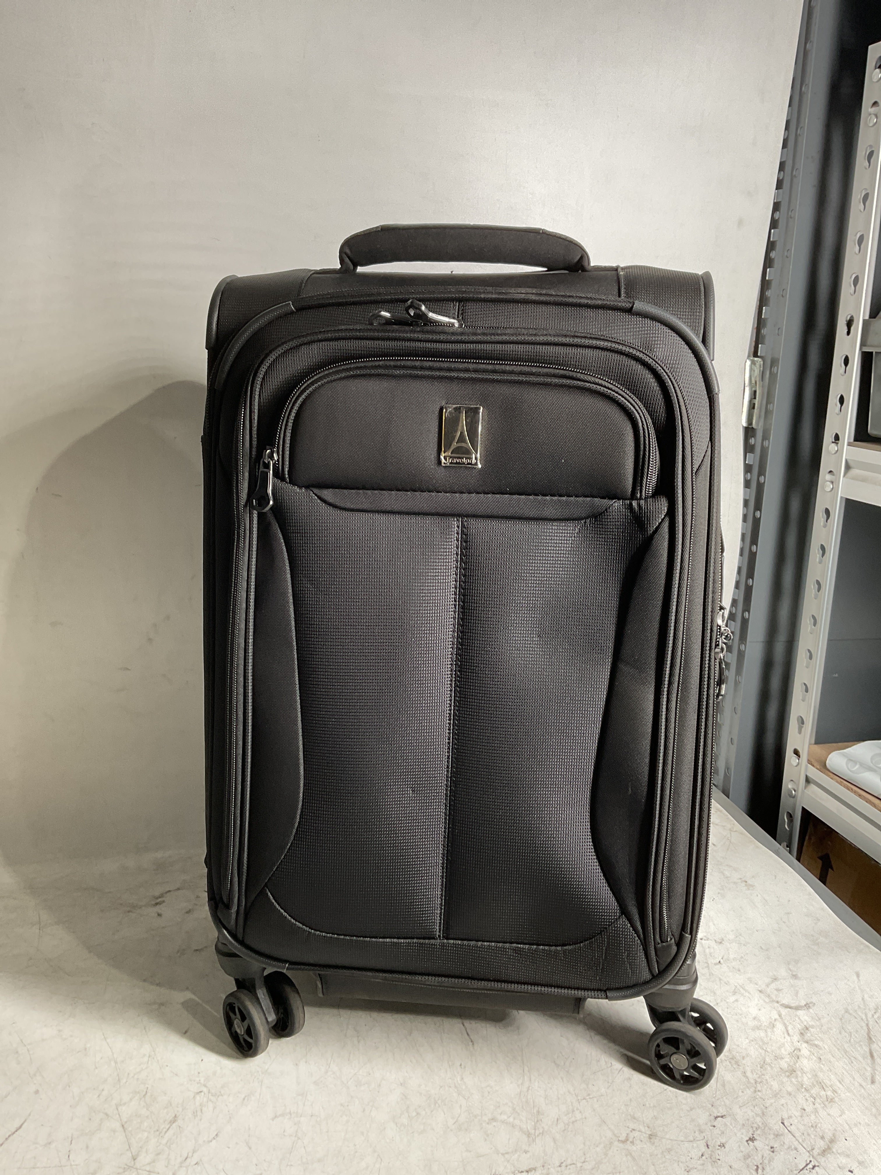 Travelpro Tourlite Softside Expandable Luggage with 4 Spinner Wheels, Lightweight Suitcase, Men and Women ( Black , Carry-On 21-Inch ) Black Carry On 21 Inch U49