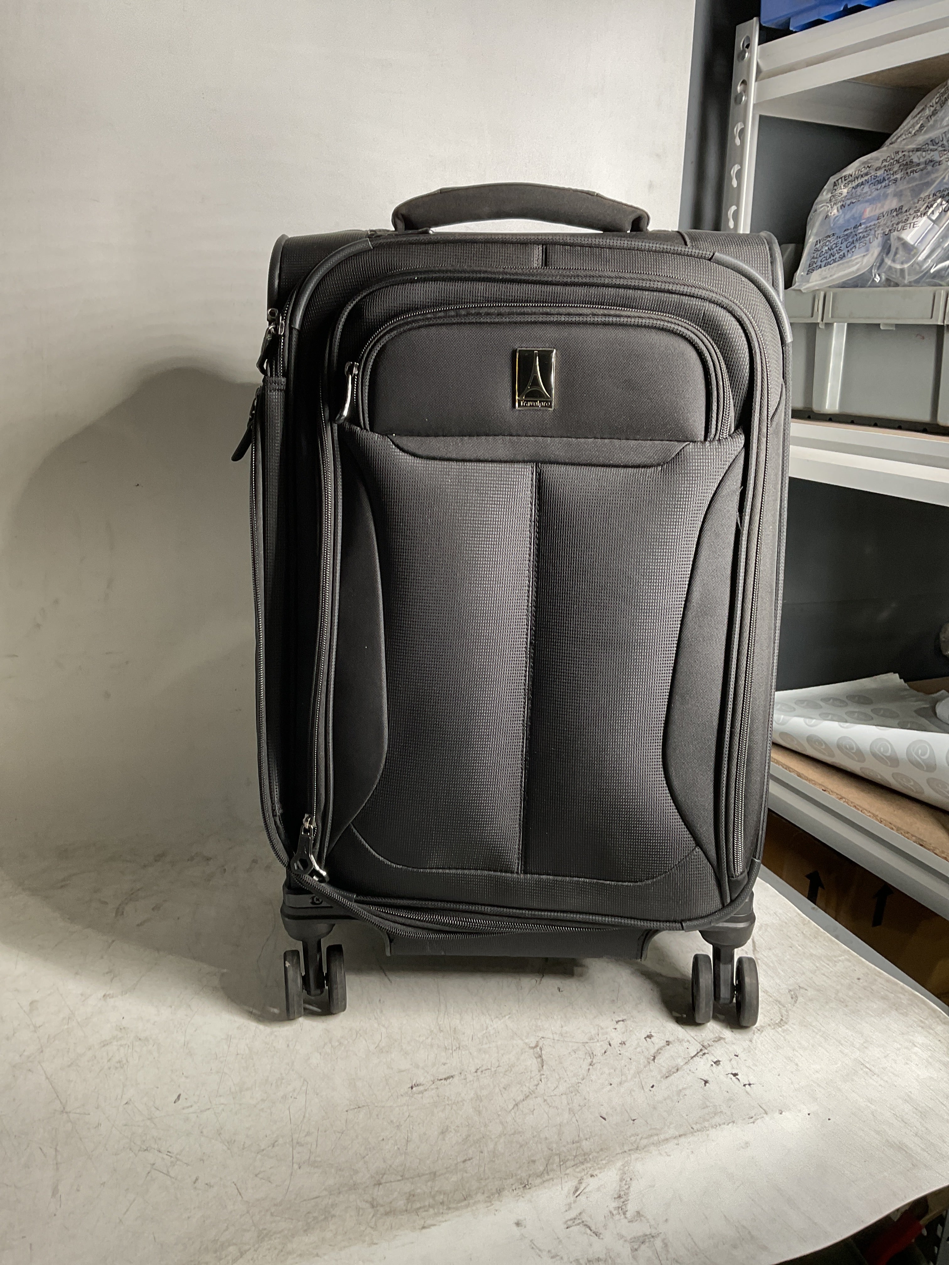 Travelpro Tourlite Softside Expandable Luggage with 4 Spinner Wheels, Lightweight Suitcase, Men and Women ( Black , Carry-On 21-Inch ) Black Carry On 21 Inch U50