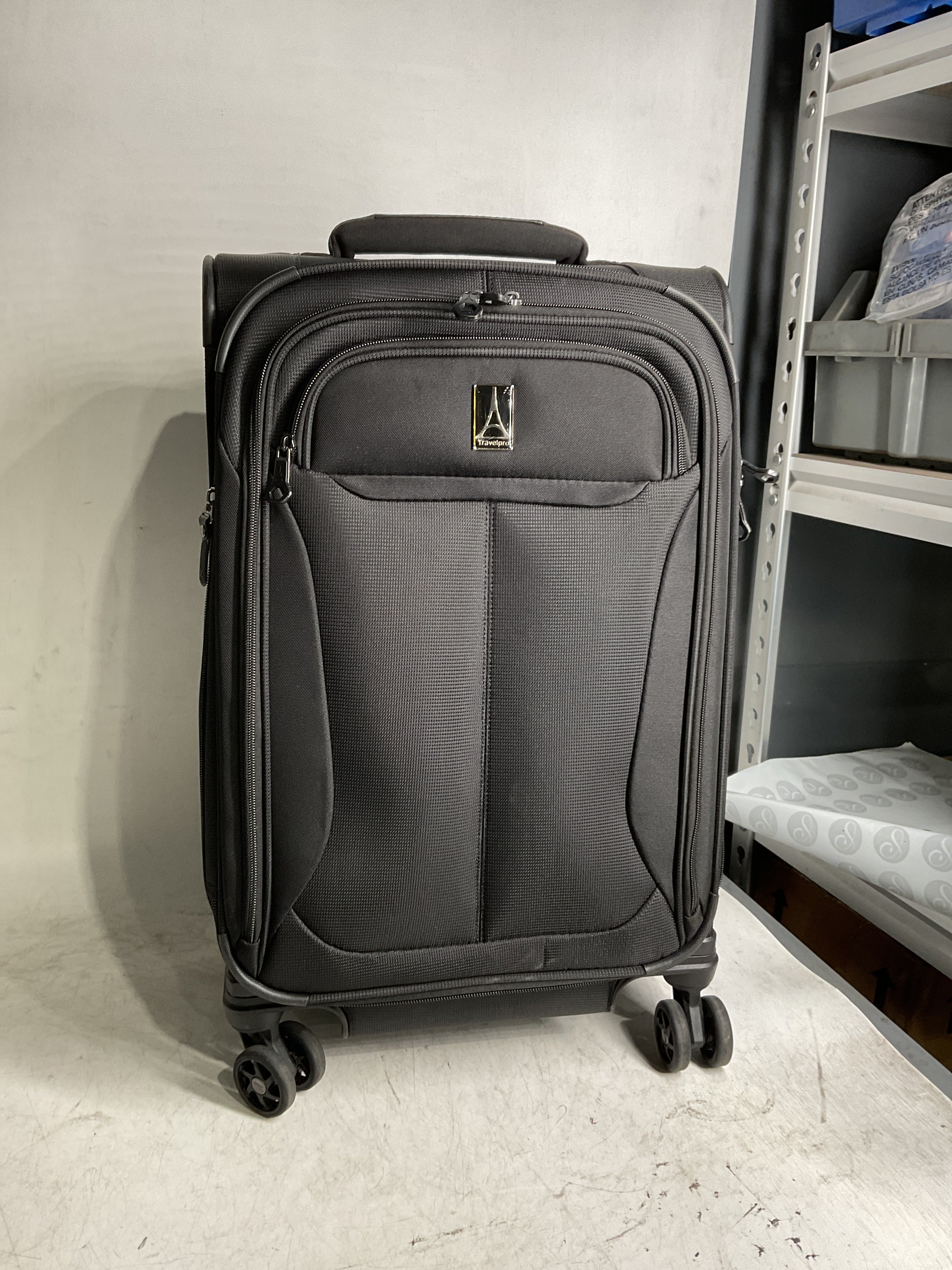 Travelpro Tourlite Softside Expandable Luggage with 4 Spinner Wheels, Lightweight Suitcase, Men and Women ( Black , Carry-On 21-Inch ) Black Carry On 21 Inch U52