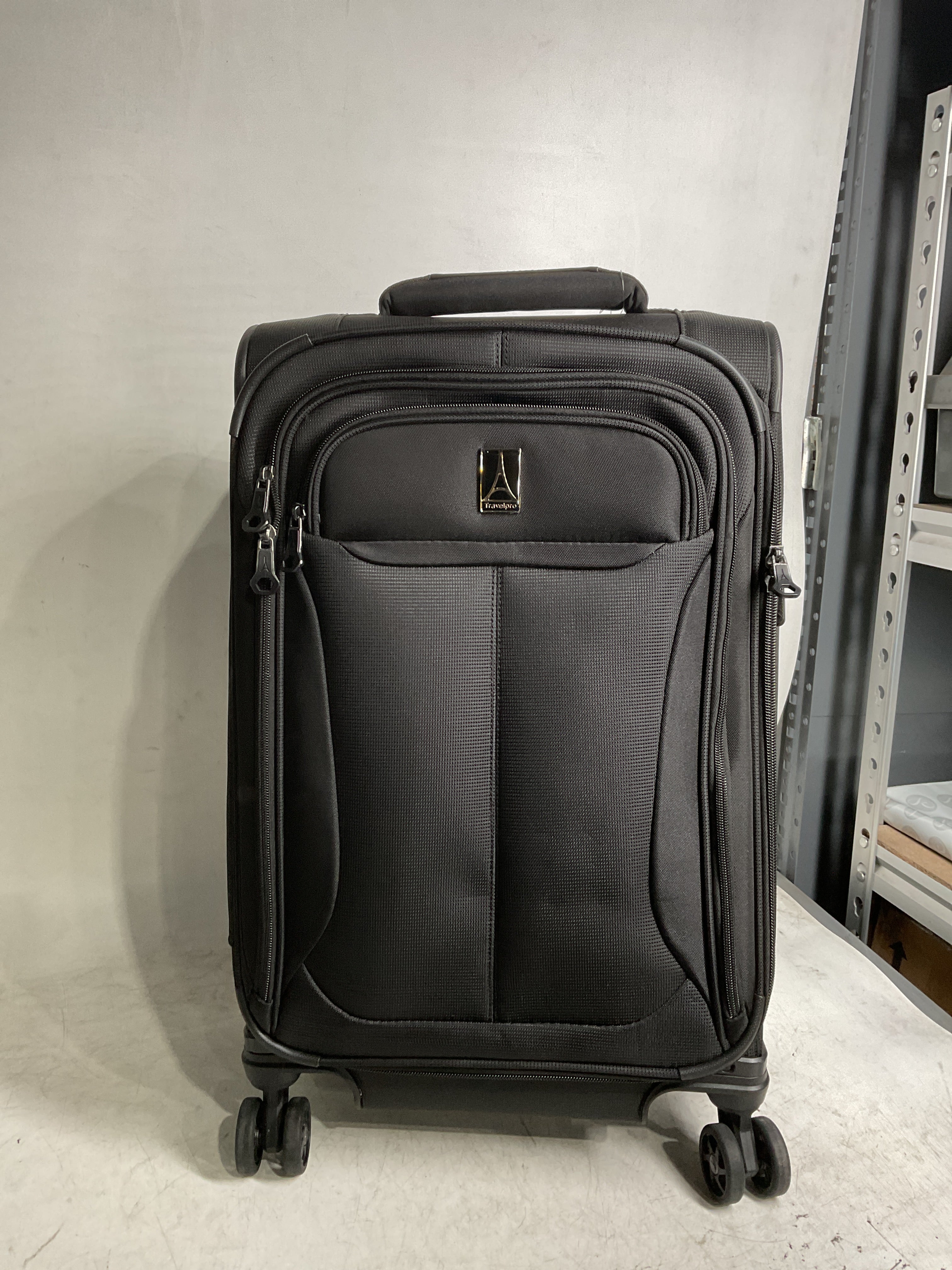 Travelpro Tourlite Softside Expandable Luggage with 4 Spinner Wheels, Lightweight Suitcase, Men and Women ( Black , Carry-On 21-Inch ) Black Carry On 21 Inch U53