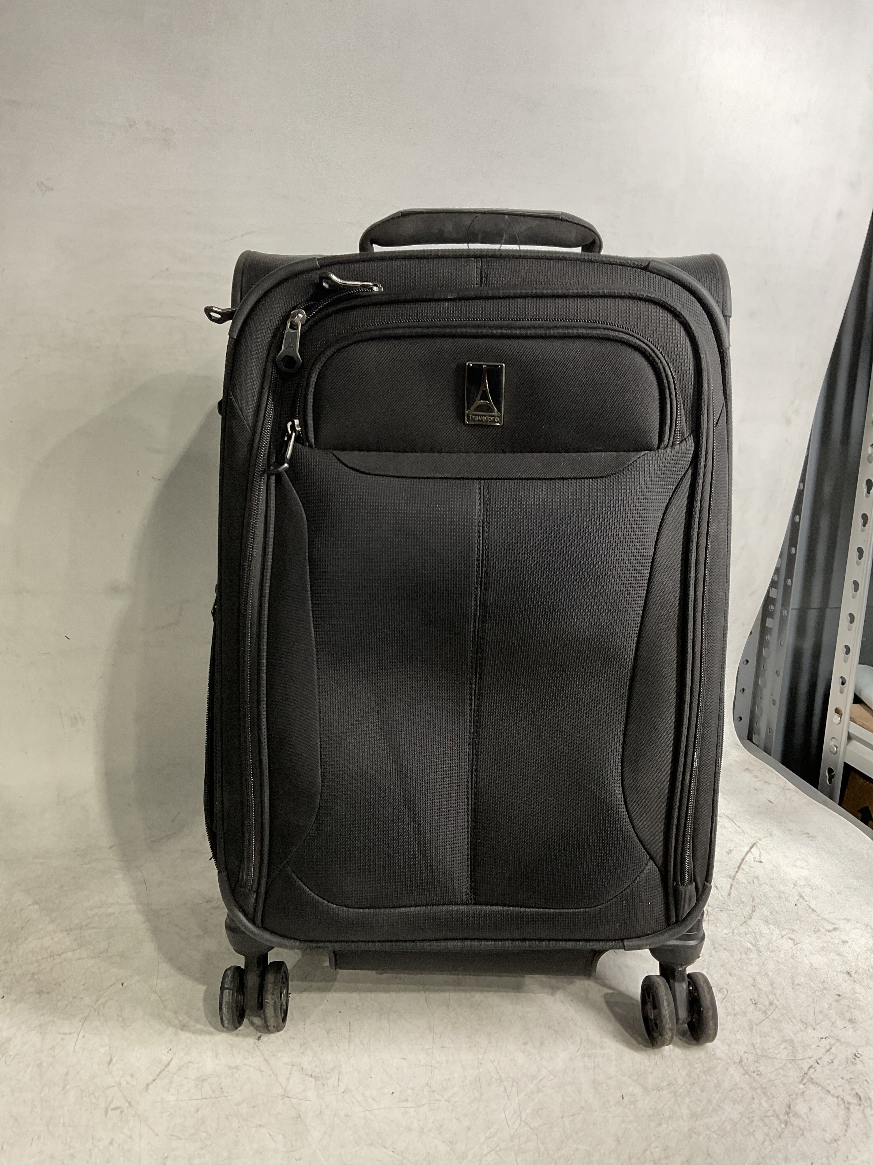 Travelpro Tourlite Softside Expandable Luggage with 4 Spinner Wheels, Lightweight Suitcase, Men and Women ( Black , Carry-On 21-Inch ) Black Carry On 21 Inch U58