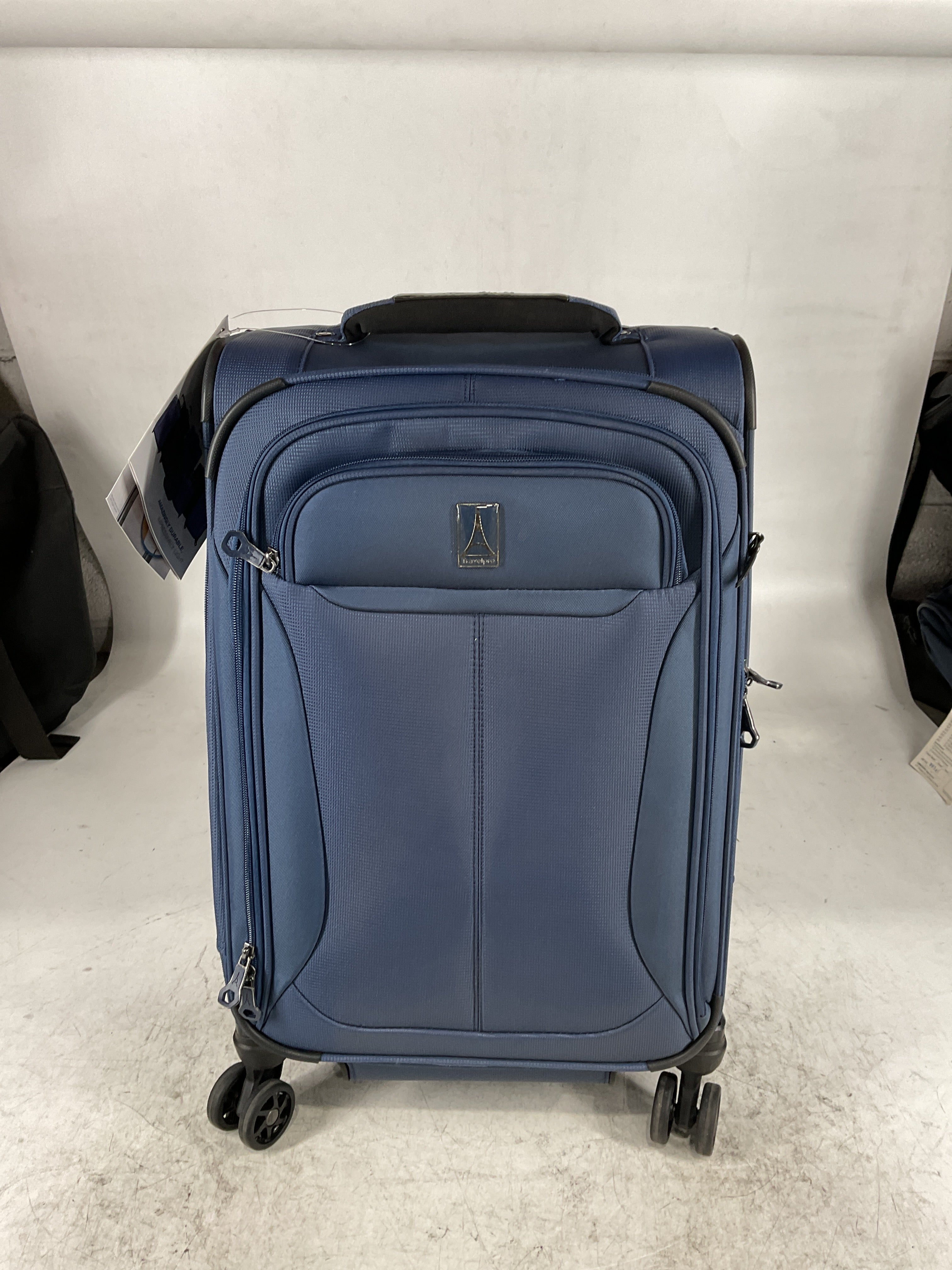 Travelpro Tourlite Softside Expandable Luggage with 4 Spinner Wheels, Lightweight Suitcase, Men and Women Blue Carry On 21 Inch U15