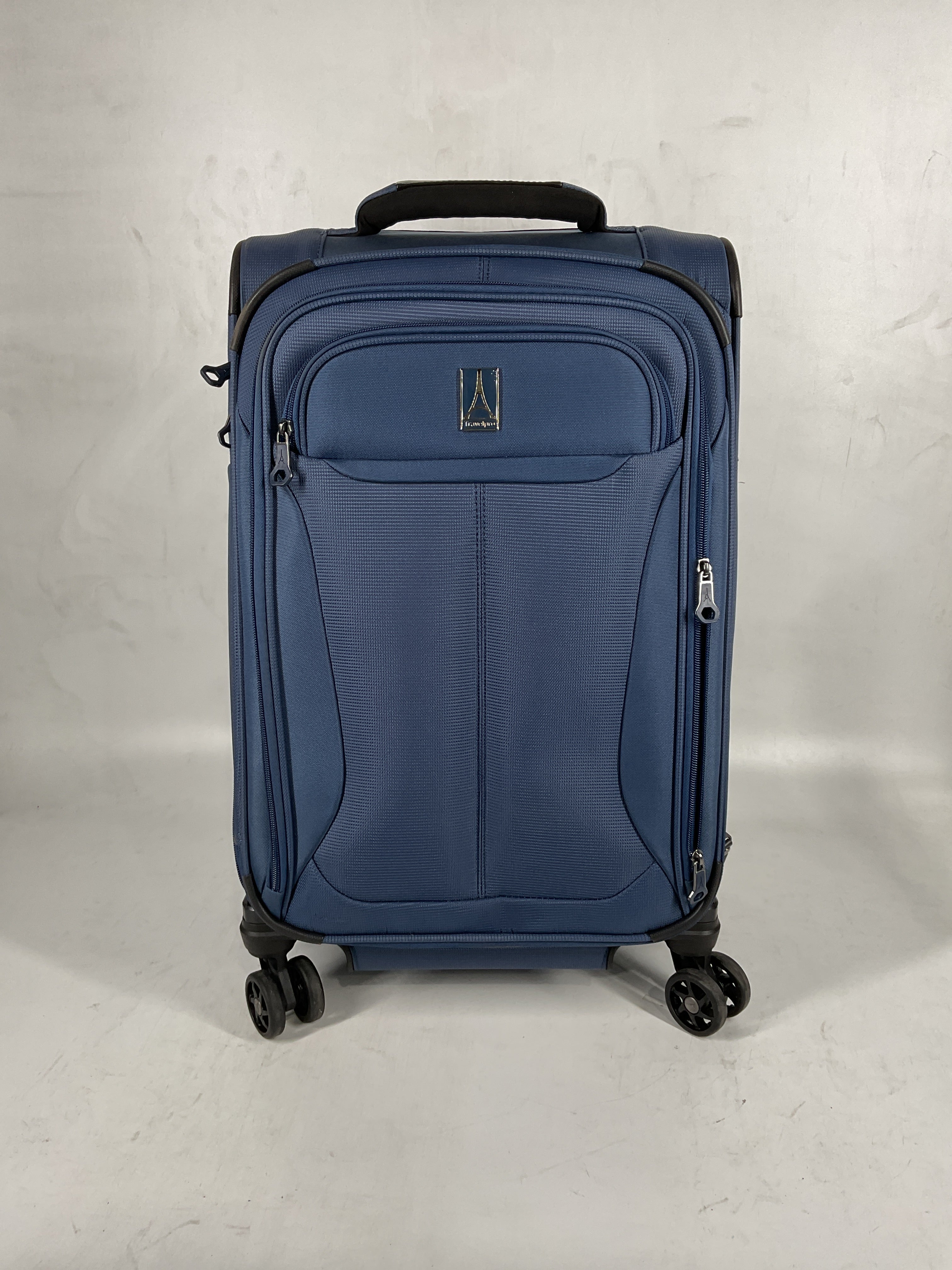 Travelpro Tourlite Softside Expandable Luggage with 4 Spinner Wheels, Lightweight Suitcase, Men and Women Blue Carry On 21 Inch U21