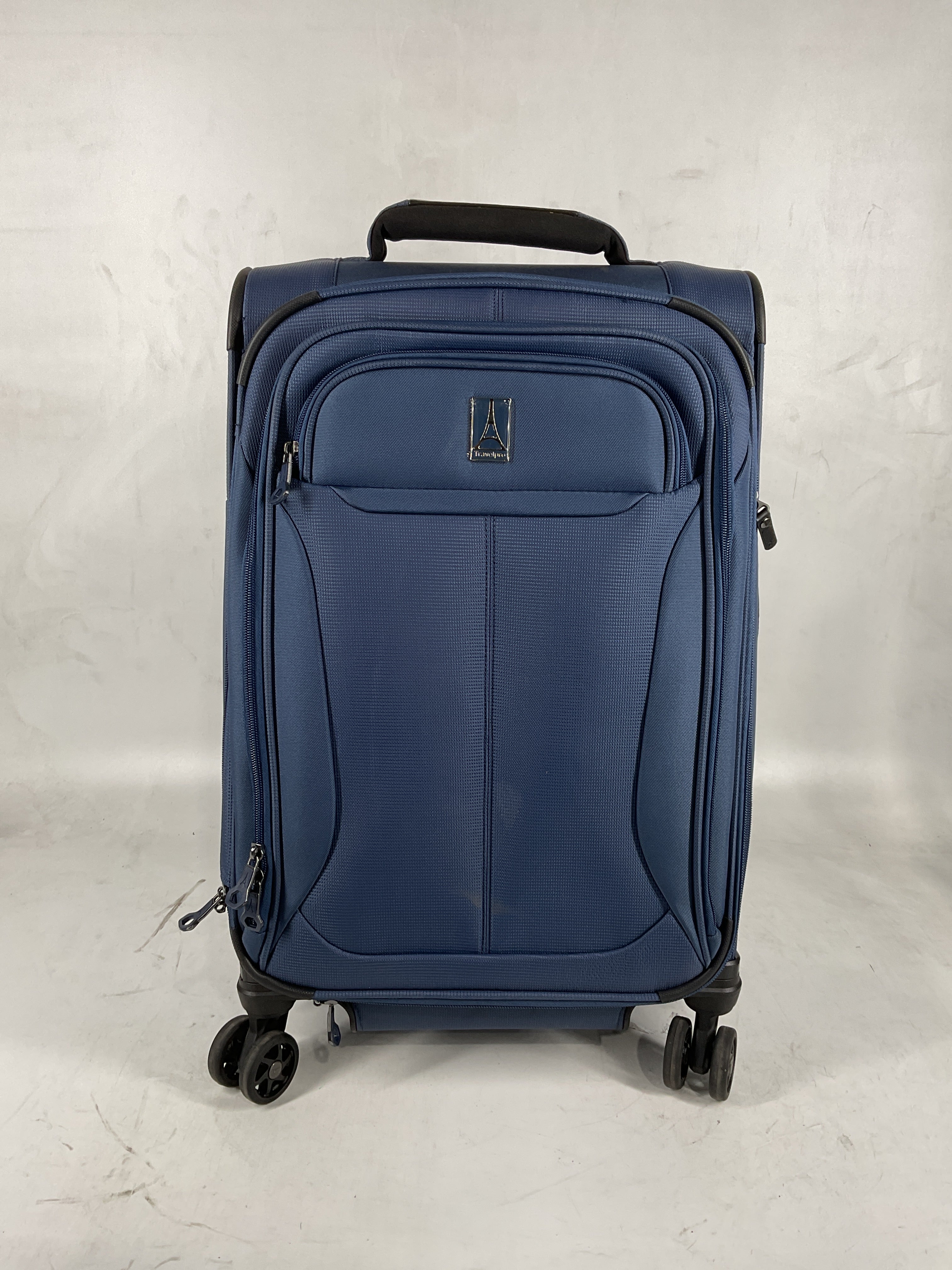 Travelpro Tourlite Softside Expandable Luggage with 4 Spinner Wheels, Lightweight Suitcase, Men and Women Blue Carry On 21 Inch U23
