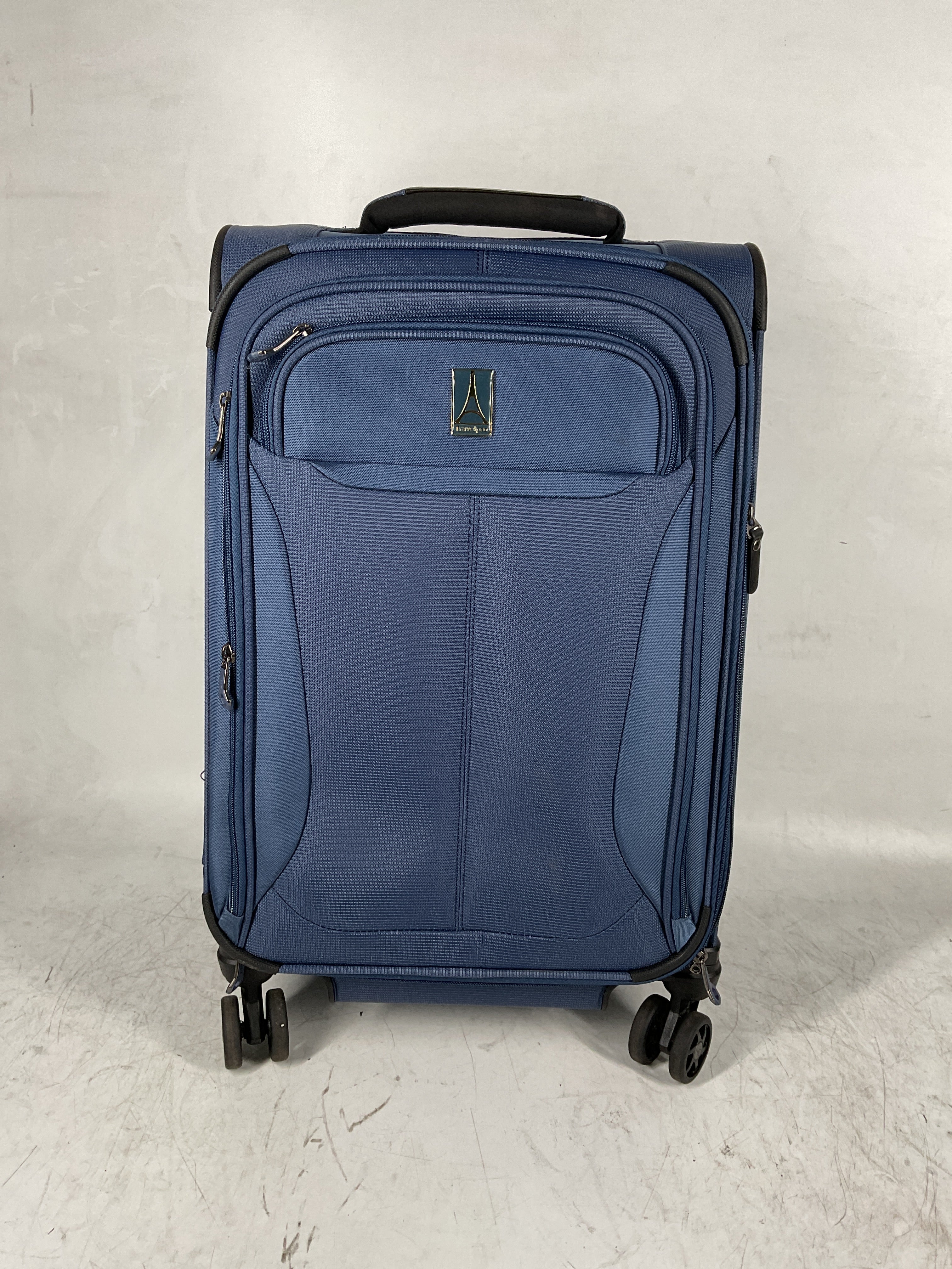 Travelpro Tourlite Softside Expandable Luggage with 4 Spinner Wheels, Lightweight Suitcase, Men and Women Blue Carry On 21 Inch U26