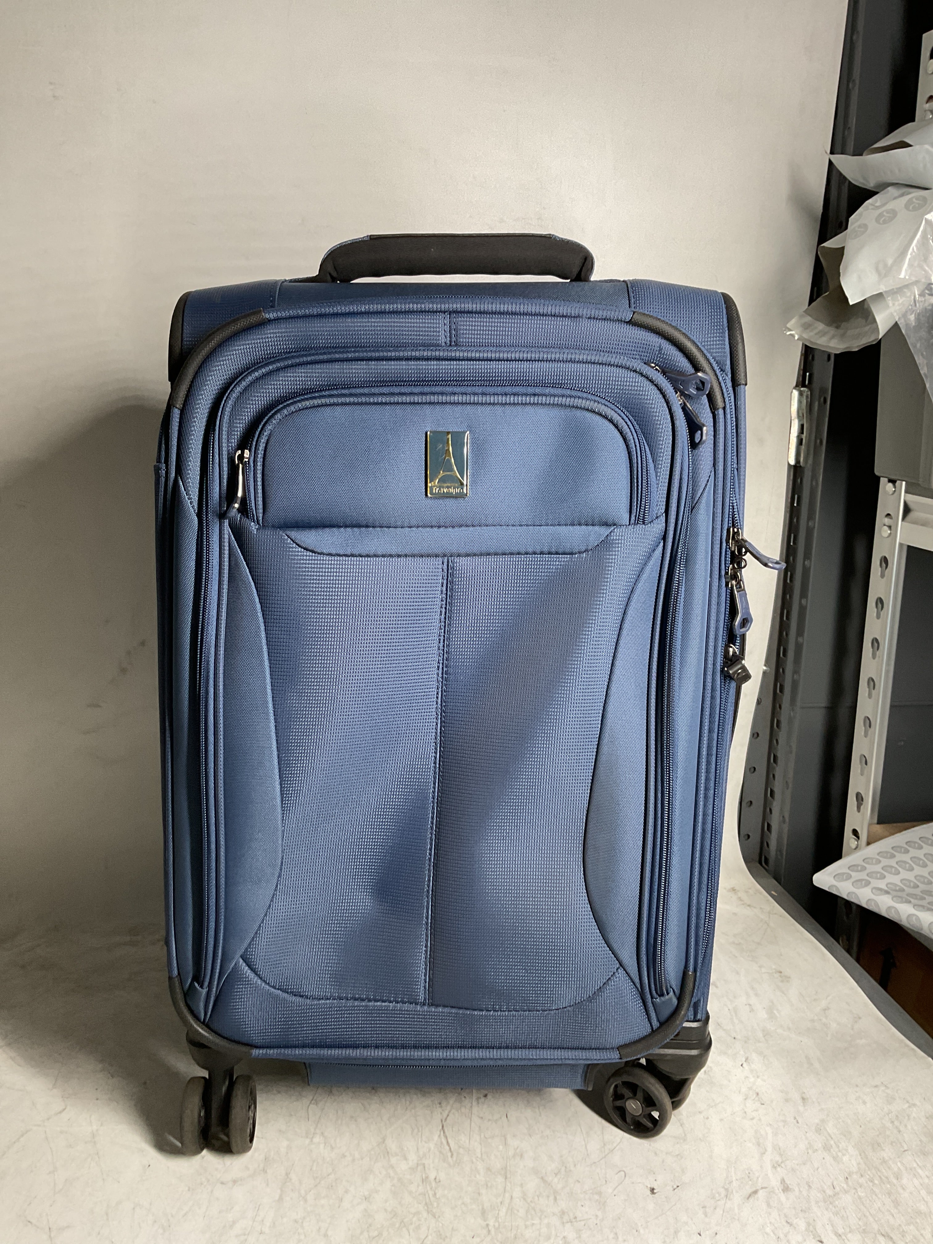 Travelpro Tourlite Softside Expandable Luggage with 4 Spinner Wheels, Lightweight Suitcase, Men and Women ( Blue , Carry-On 21-Inch ) Blue Carry On 21 Inch U31