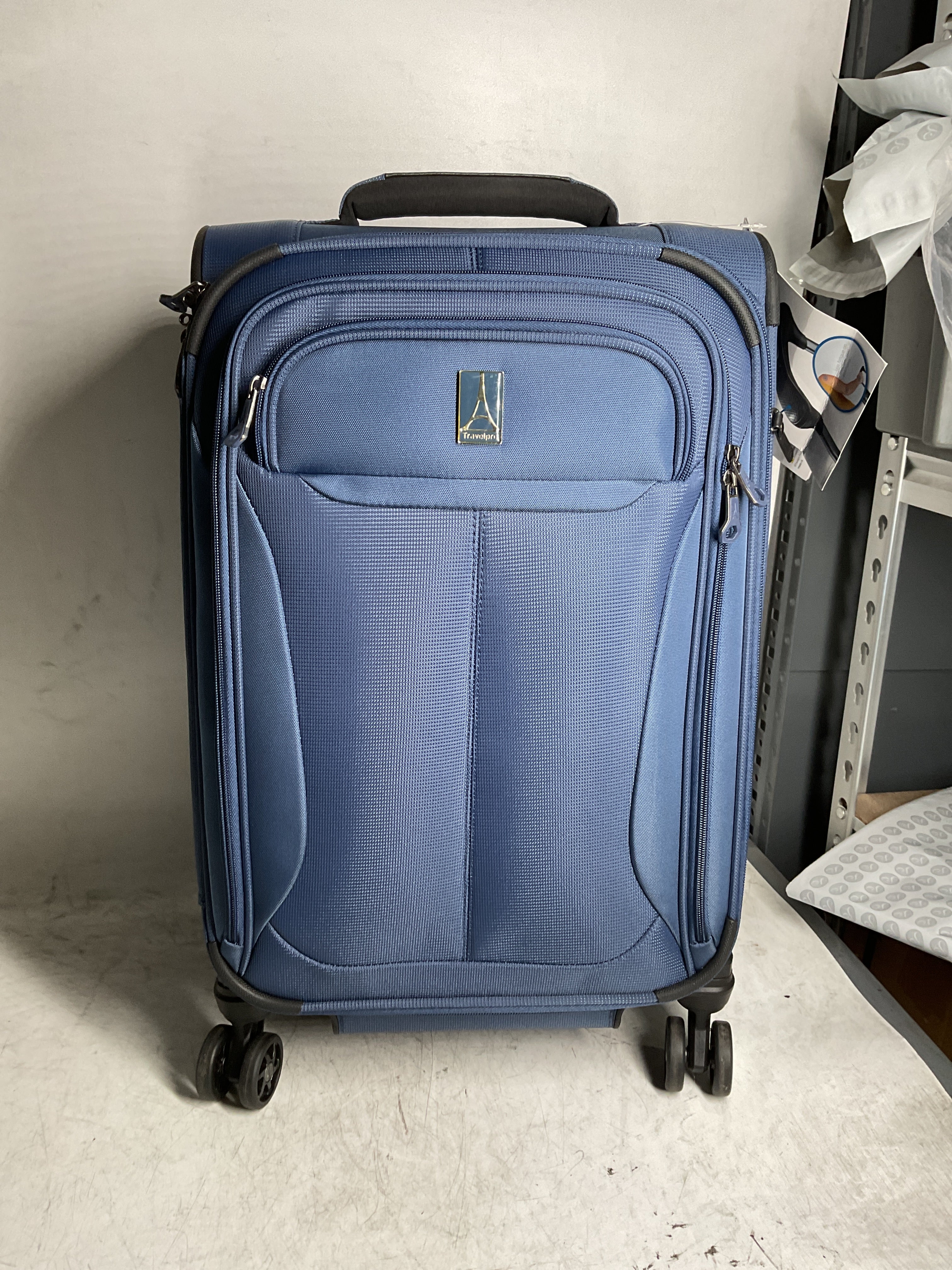 Travelpro Tourlite Softside Expandable Luggage with 4 Spinner Wheels, Lightweight Suitcase, Men and Women ( Blue , Carry-On 21-Inch ) Blue Carry On 21 Inch U32