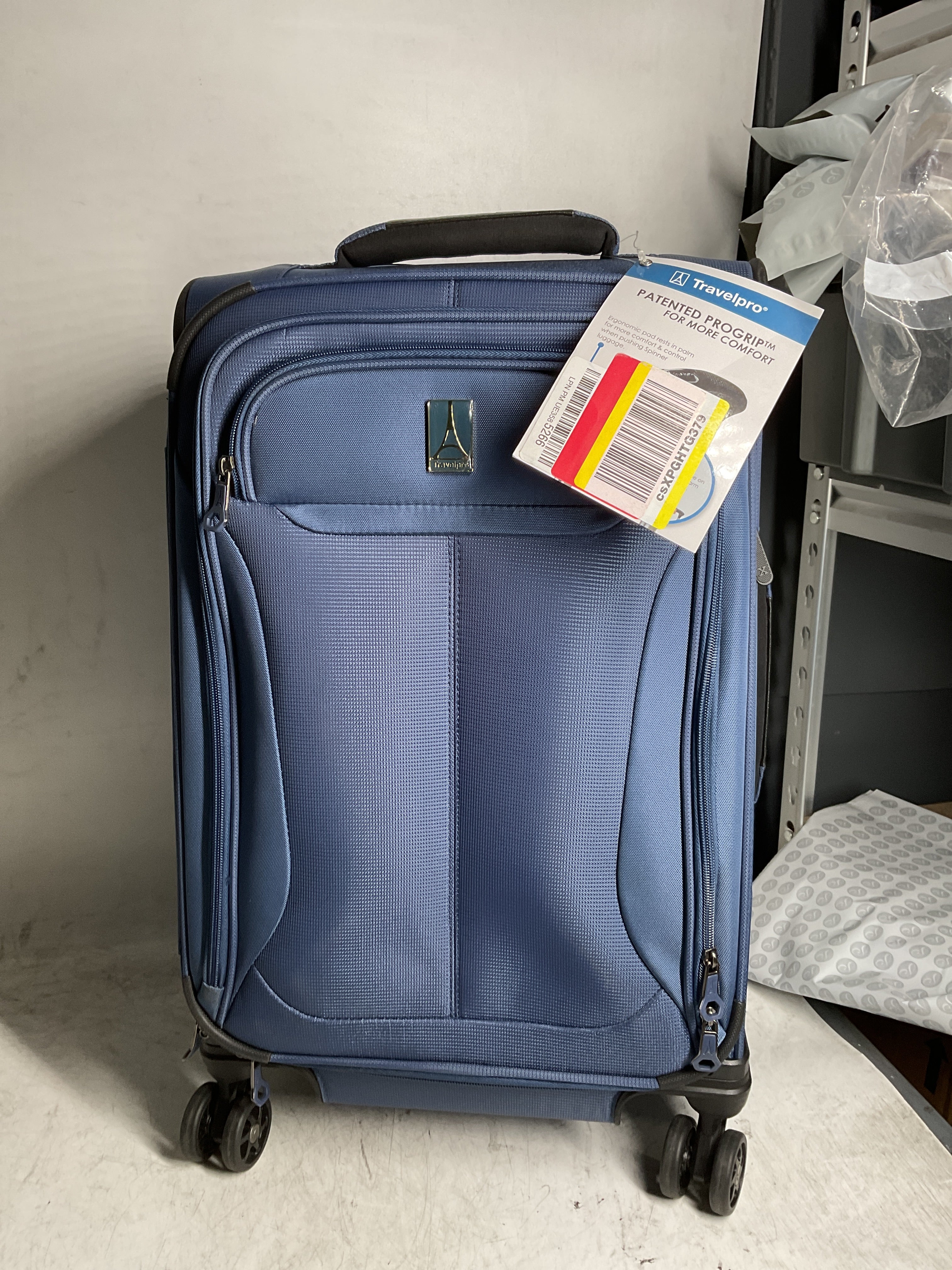 Travelpro Tourlite Softside Expandable Luggage with 4 Spinner Wheels, Lightweight Suitcase, Men and Women ( Blue , Carry-On 21-Inch ) Blue Carry On 21 Inch U34