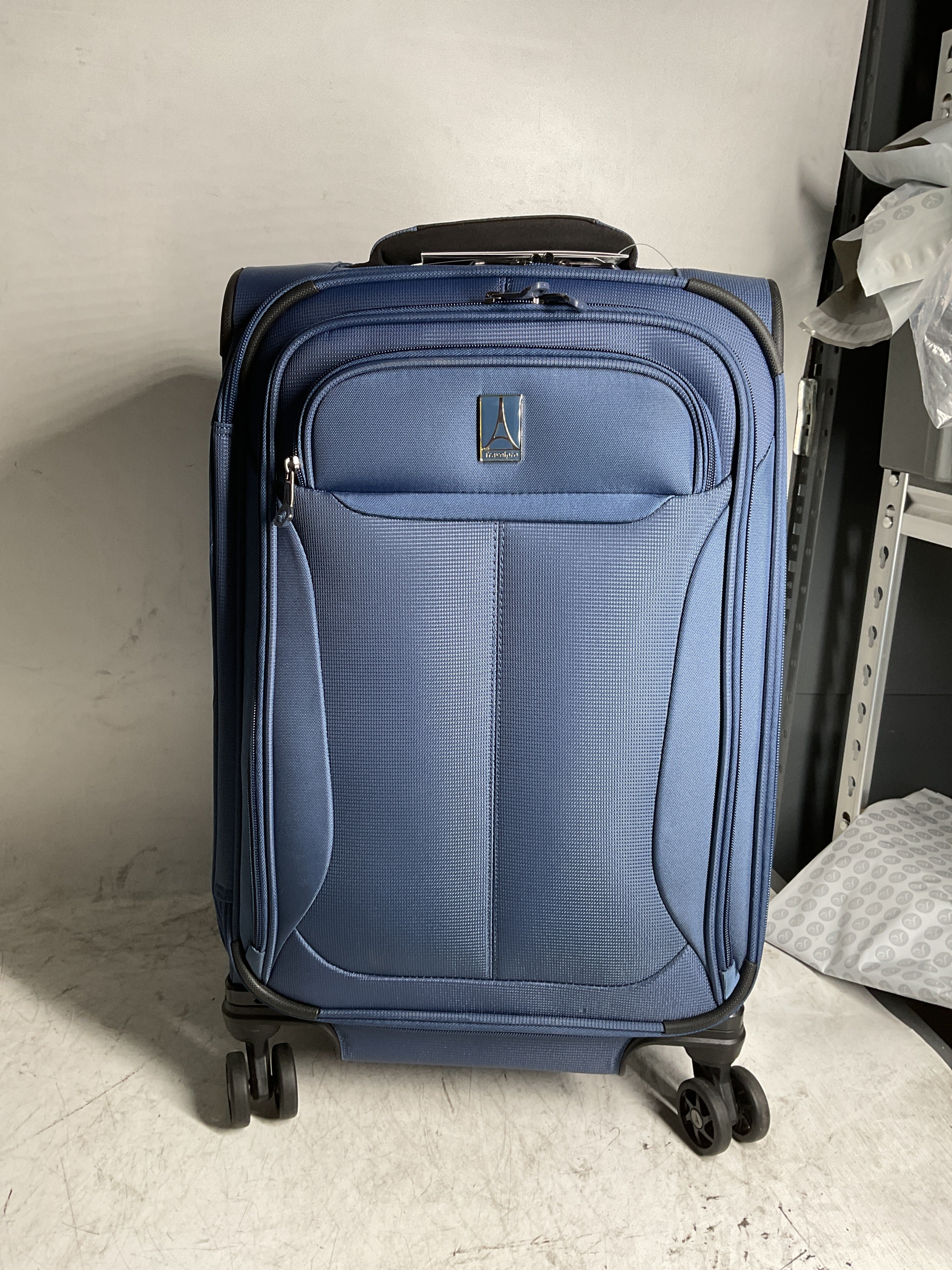 Travelpro Tourlite Softside Expandable Luggage with 4 Spinner Wheels, Lightweight Suitcase, Men and Women ( Blue , Carry-On 21-Inch ) Blue Carry On 21 Inch U35