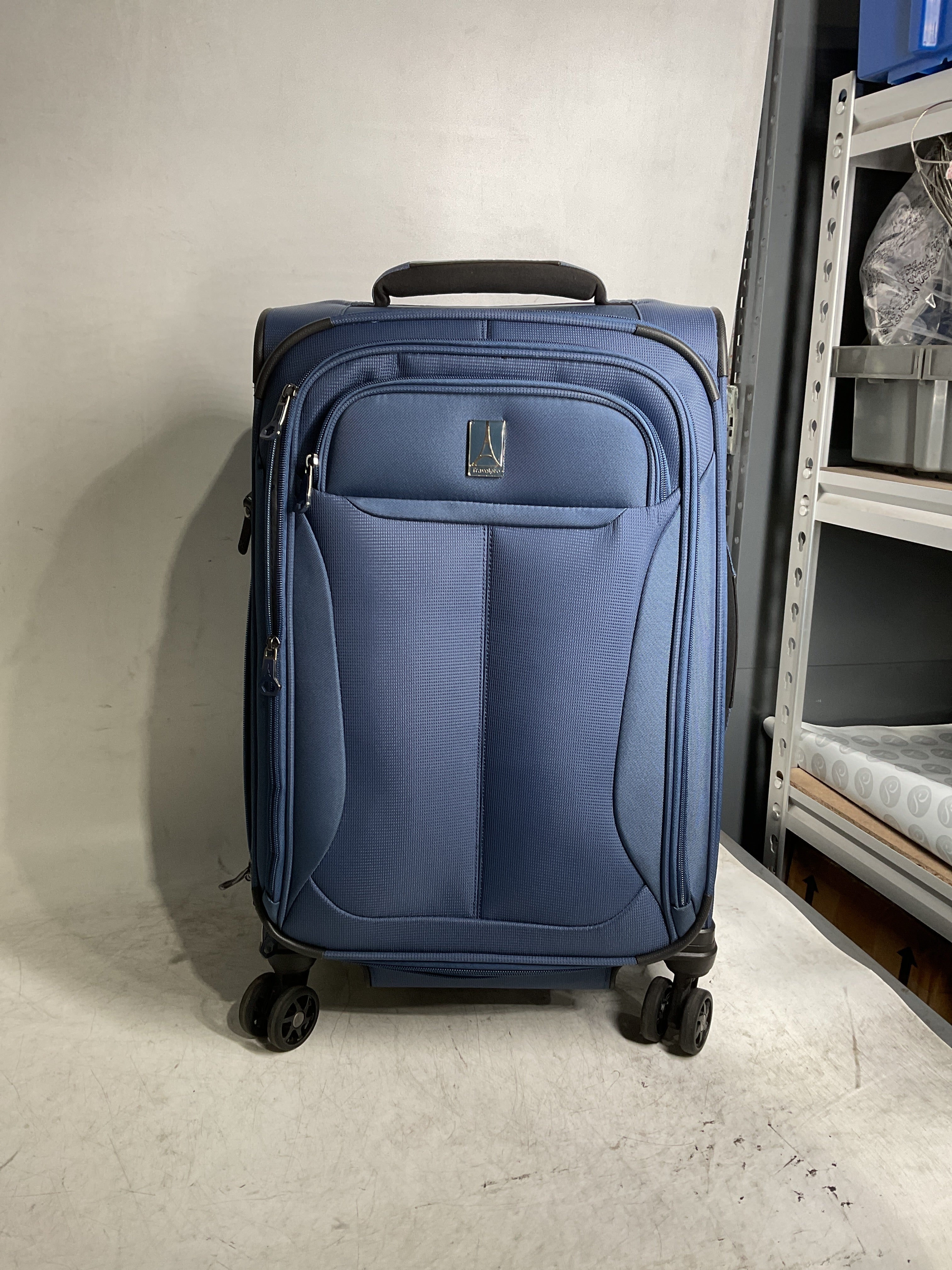 Travelpro Tourlite Softside Expandable Luggage with 4 Spinner Wheels, Lightweight Suitcase, Men and Women ( Blue , Carry-On 21-Inch ) Blue Carry On 21 Inch U37