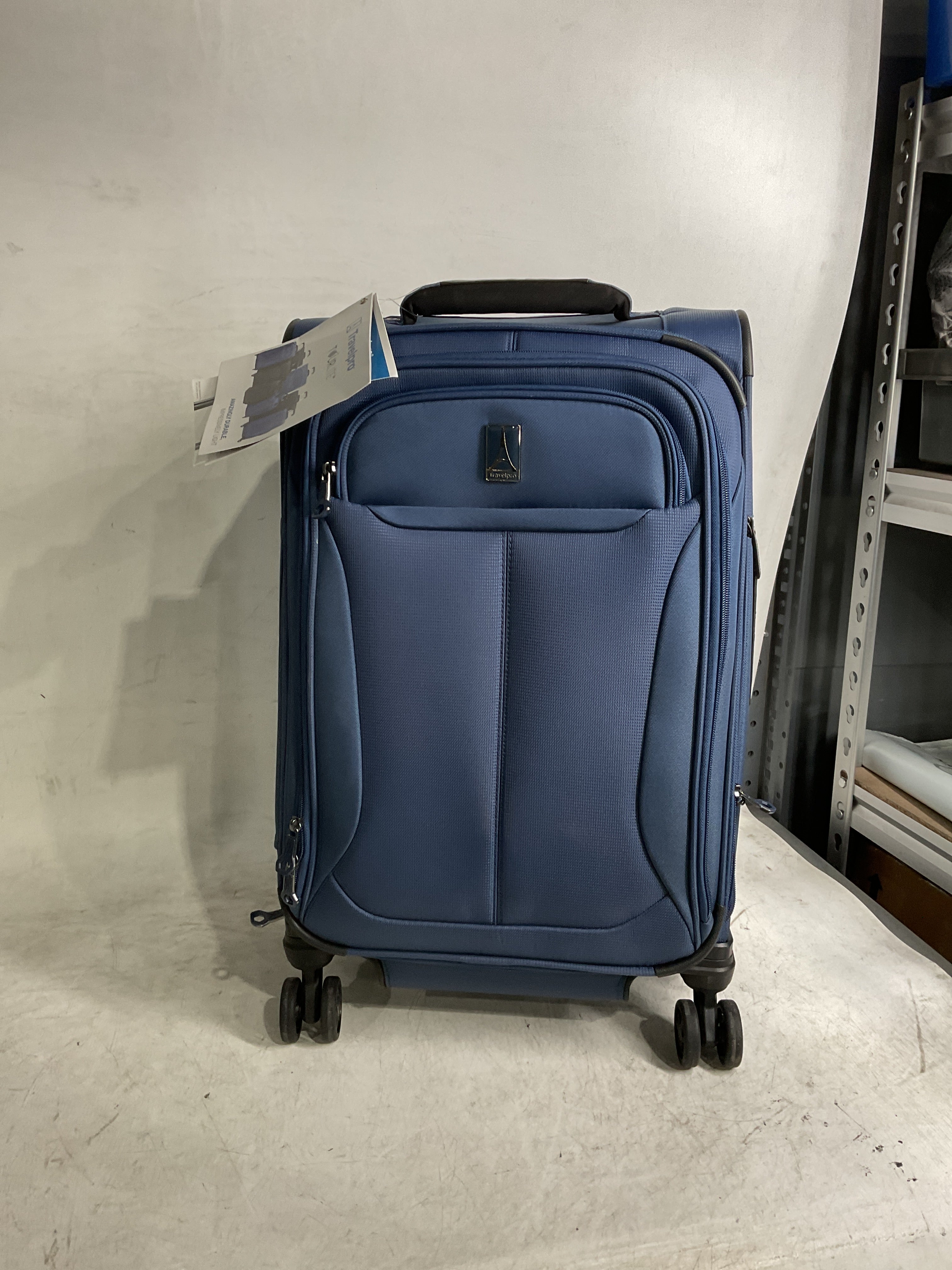 Travelpro Tourlite Softside Expandable Luggage with 4 Spinner Wheels, Lightweight Suitcase, Men and Women ( Blue , Carry-On 21-Inch ) Blue Carry On 21 Inch U40