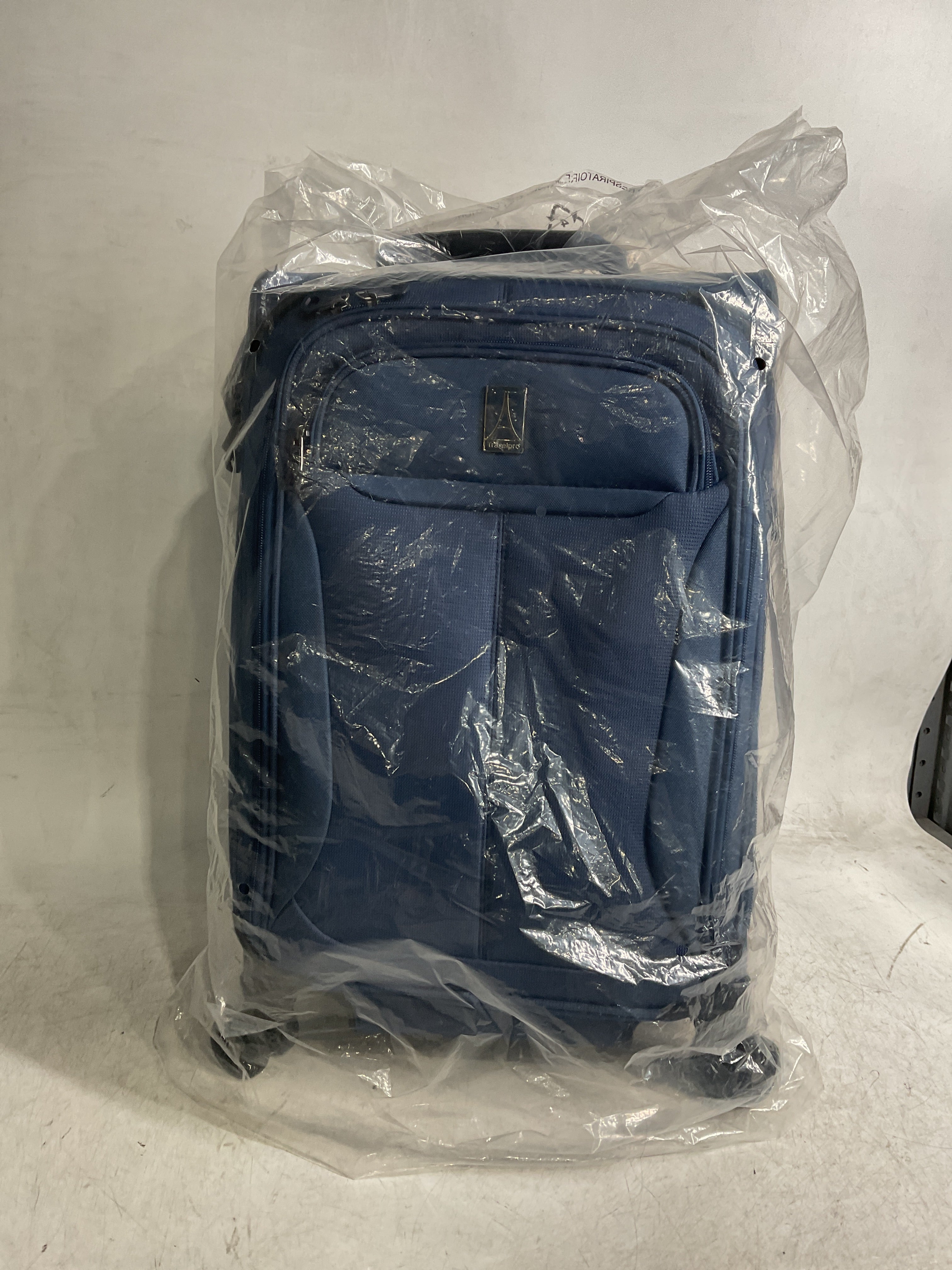 Travelpro Tourlite Softside Expandable Luggage with 4 Spinner Wheels, Lightweight Suitcase, Men and Women ( Blue , Carry-On 21-Inch ) Blue Carry On 21 Inch U41
