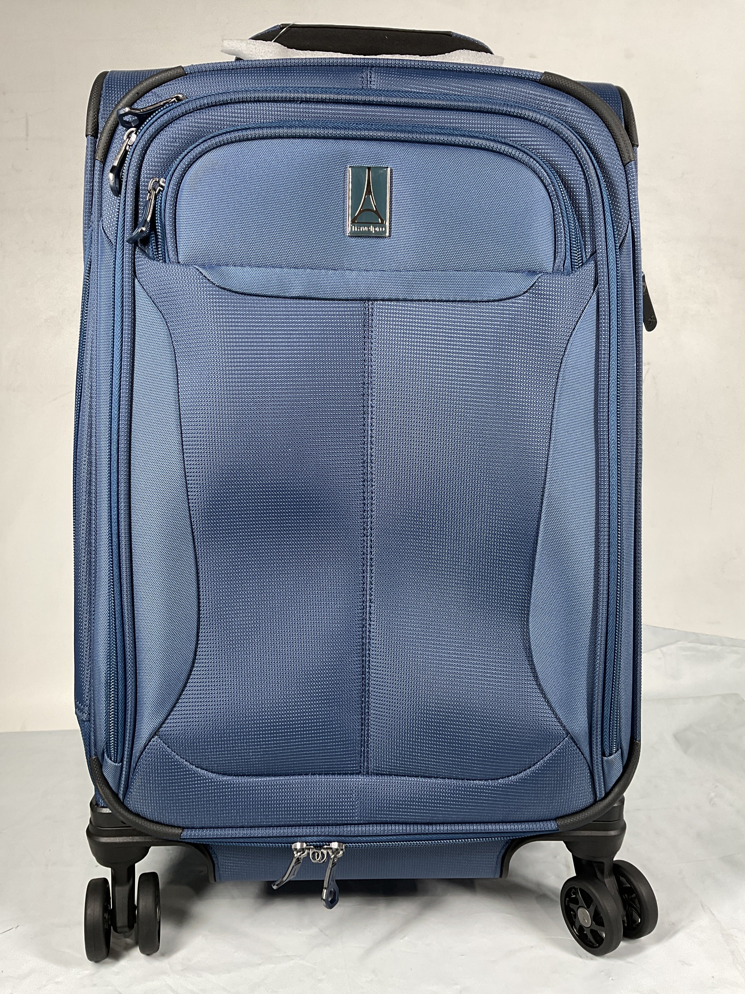 Travelpro Tourlite Softside Expandable Luggage with 4 Spinner Wheels, Lightweight Suitcase, Men and Women ( Blue , Carry-On 21-Inch ) Blue Carry On 21 Inch U48