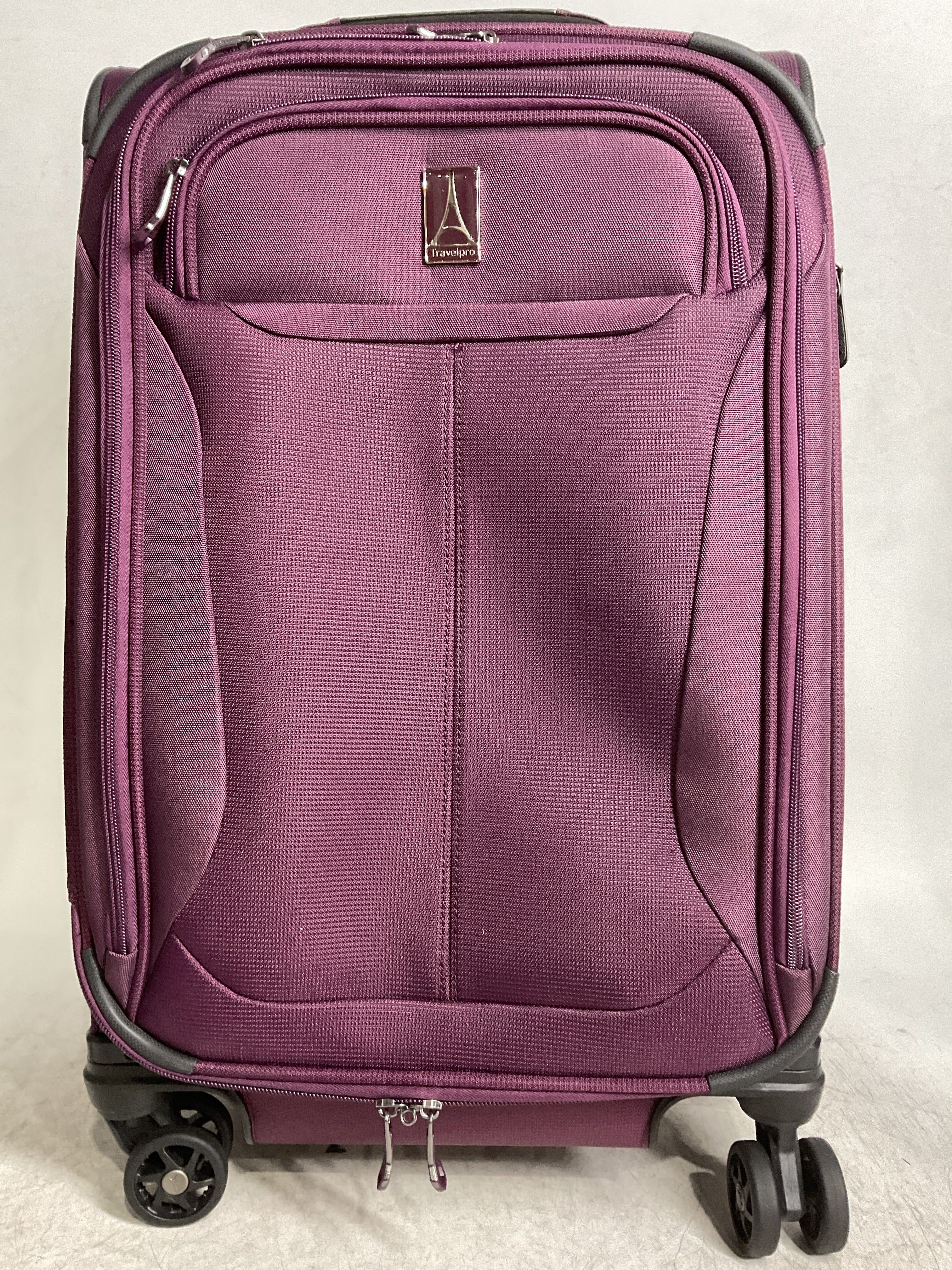 Travelpro Tourlite Softside Expandable Luggage with 4 Spinner Wheels, Lightweight Suitcase, Men and Women ( Deep Purple , Carry-On 21-Inch ) Deep Purple Carry On 21 Inch U12