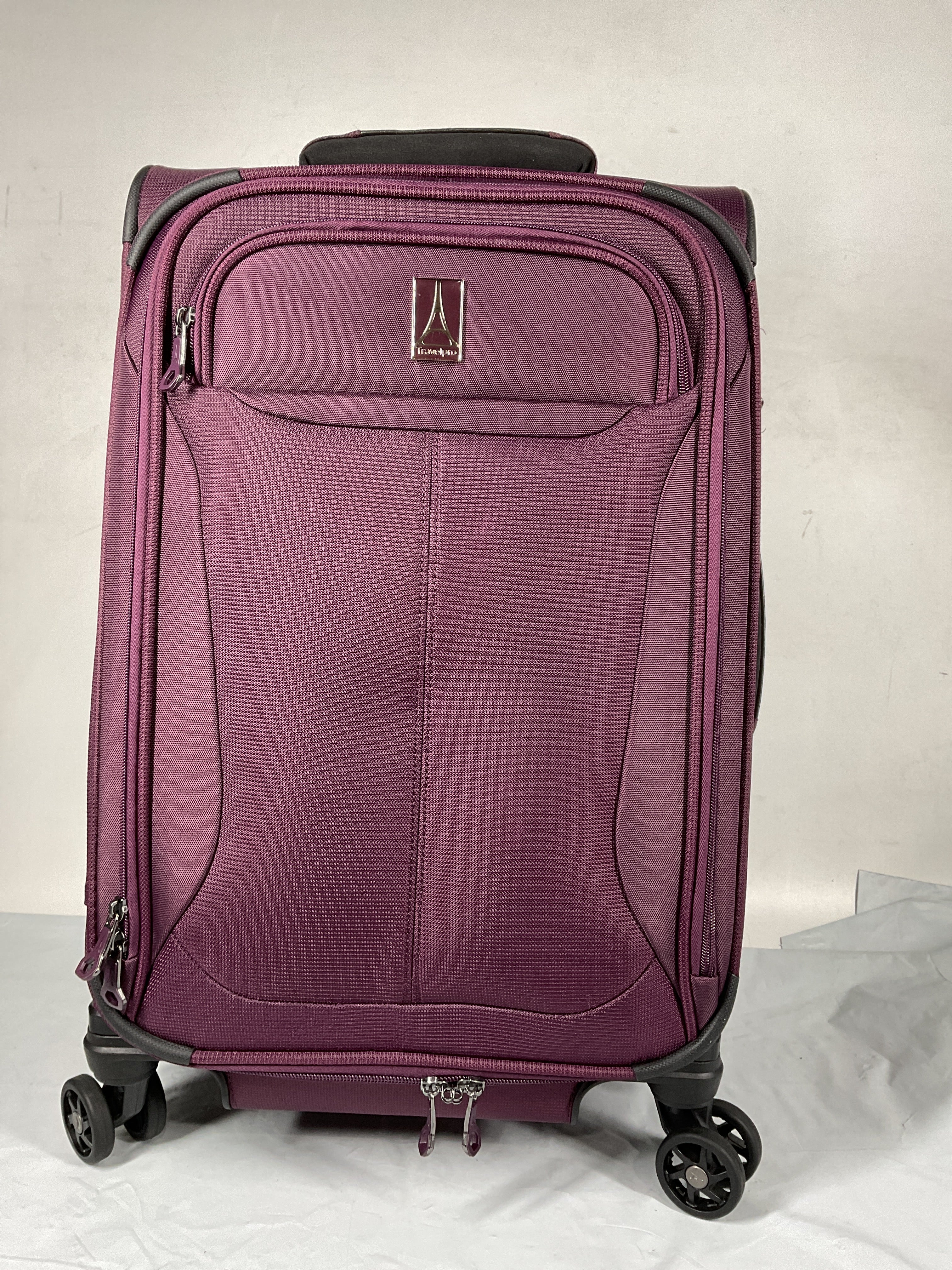 Travelpro Tourlite Softside Expandable Luggage with 4 Spinner Wheels, Lightweight Suitcase, Men and Women ( Deep Purple , Carry-On 21-Inch ) Deep Purple Carry On 21 Inch U17