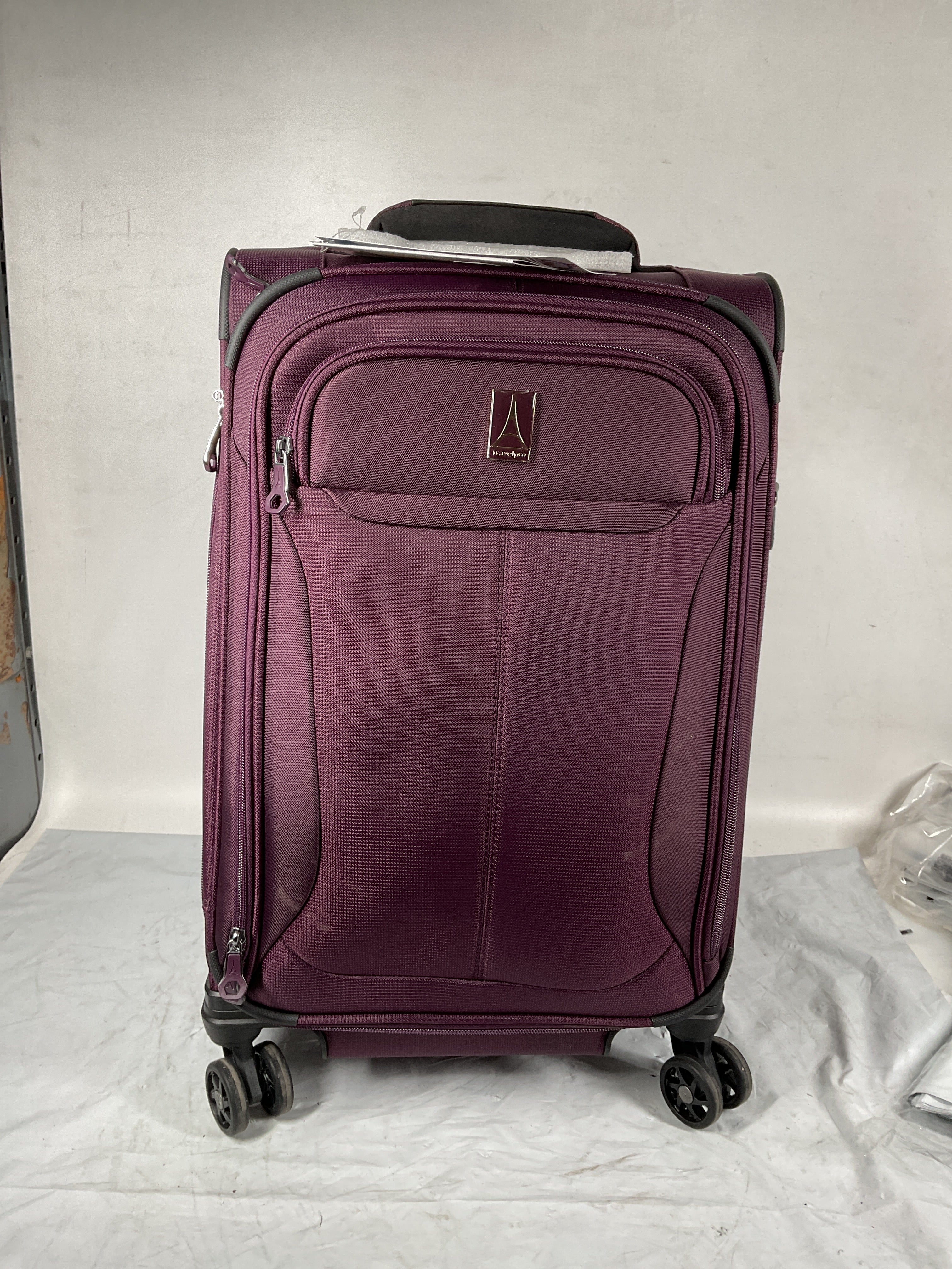 Travelpro Tourlite Softside 21" Expandable Luggage with 4 Spinner Wheels, Lightweight Suitcase, Carry-On ( Deep Purple , Carry-On 21-Inch ) Deep Purple Carry On 21 Inch U21