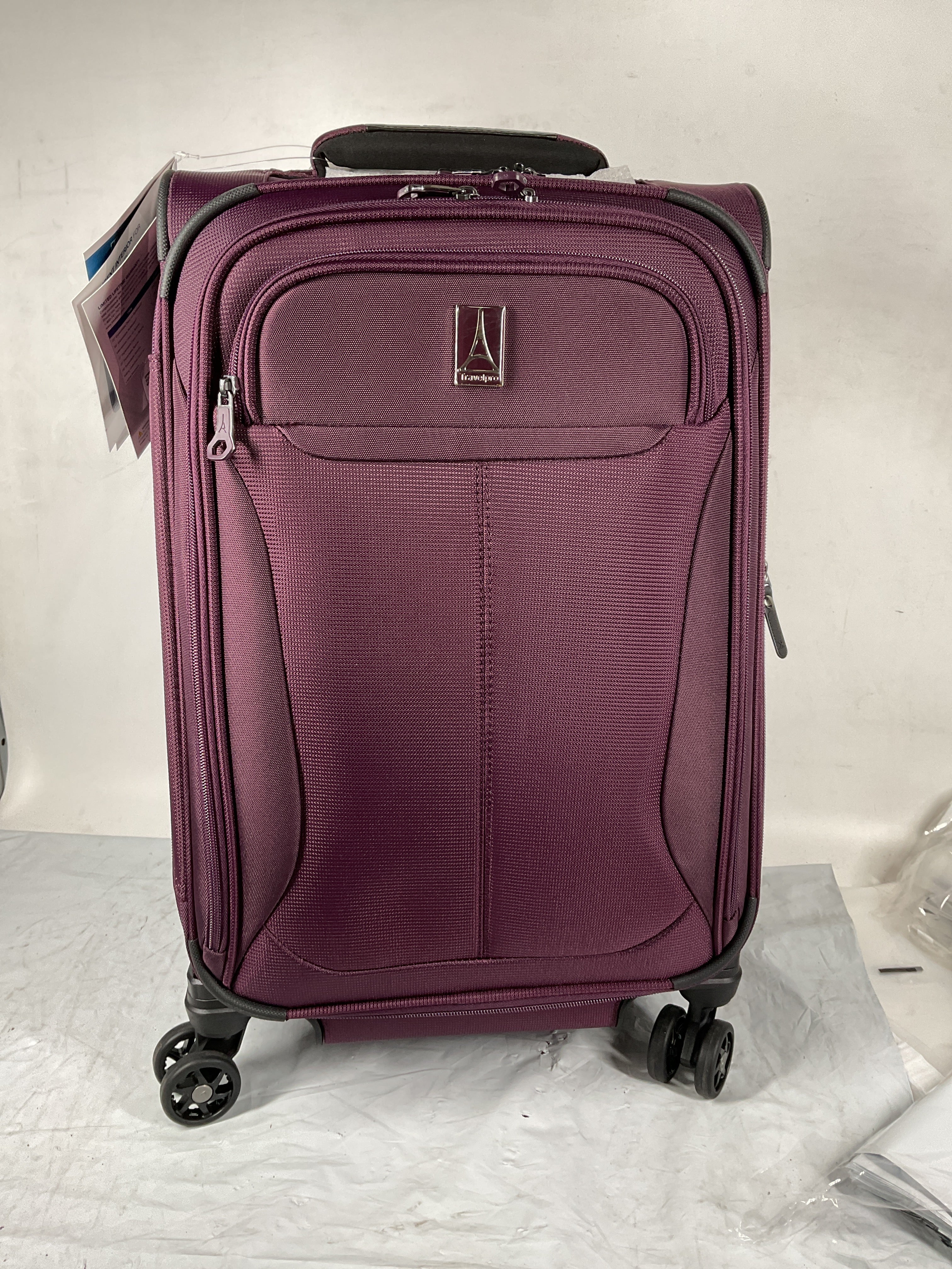 Travelpro Tourlite Softside 21" Expandable Luggage with 4 Spinner Wheels, Lightweight Suitcase, Carry-On ( Deep Purple , Carry-On 21-Inch ) Deep Purple Carry On 21 Inch U22