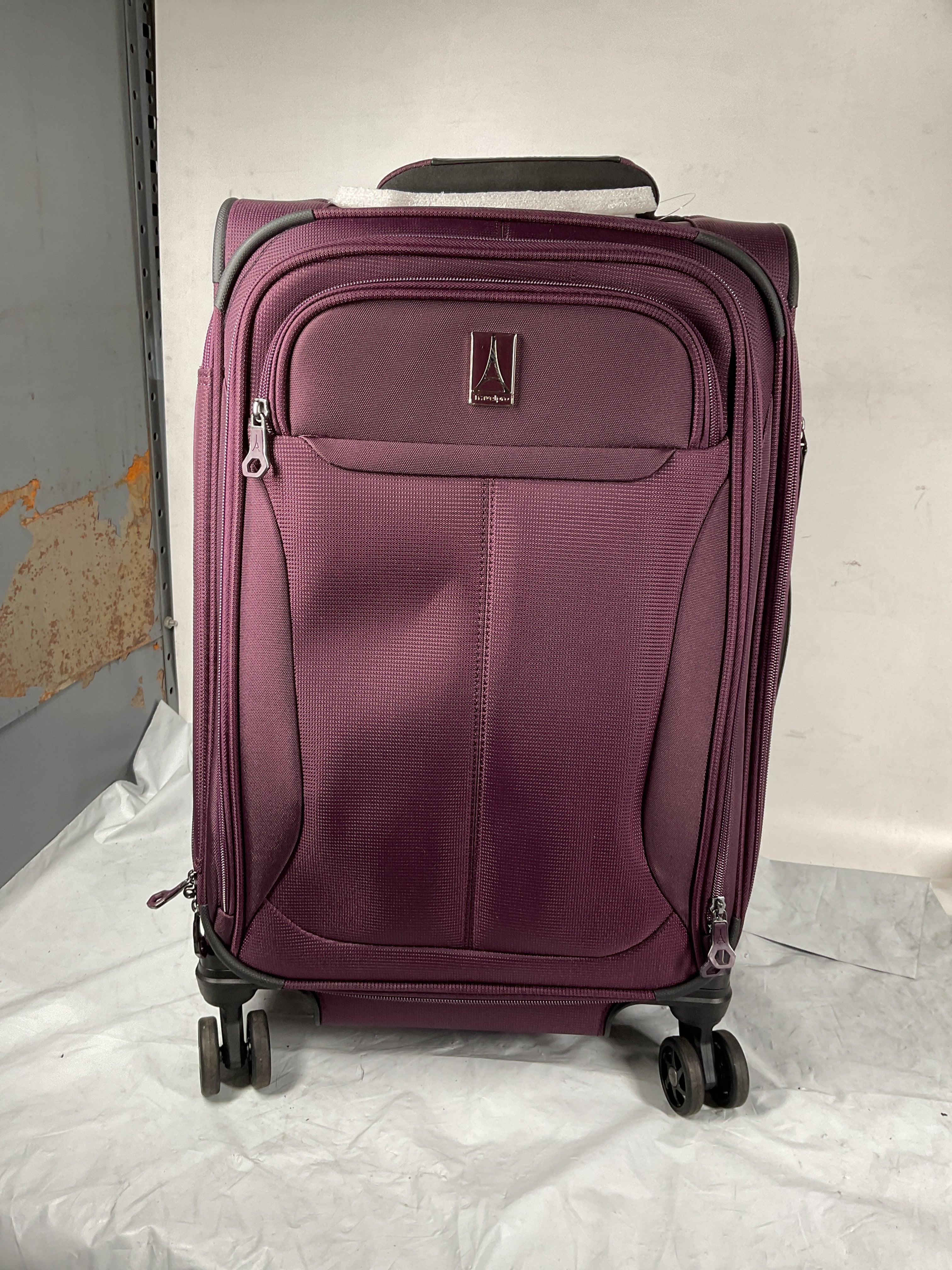 Travelpro Tourlite Softside 21" Expandable Luggage with 4 Spinner Wheels, Lightweight Suitcase, Carry-On ( Deep Purple , Carry-On 21-Inch ) Deep Purple Carry On 21 Inch U24