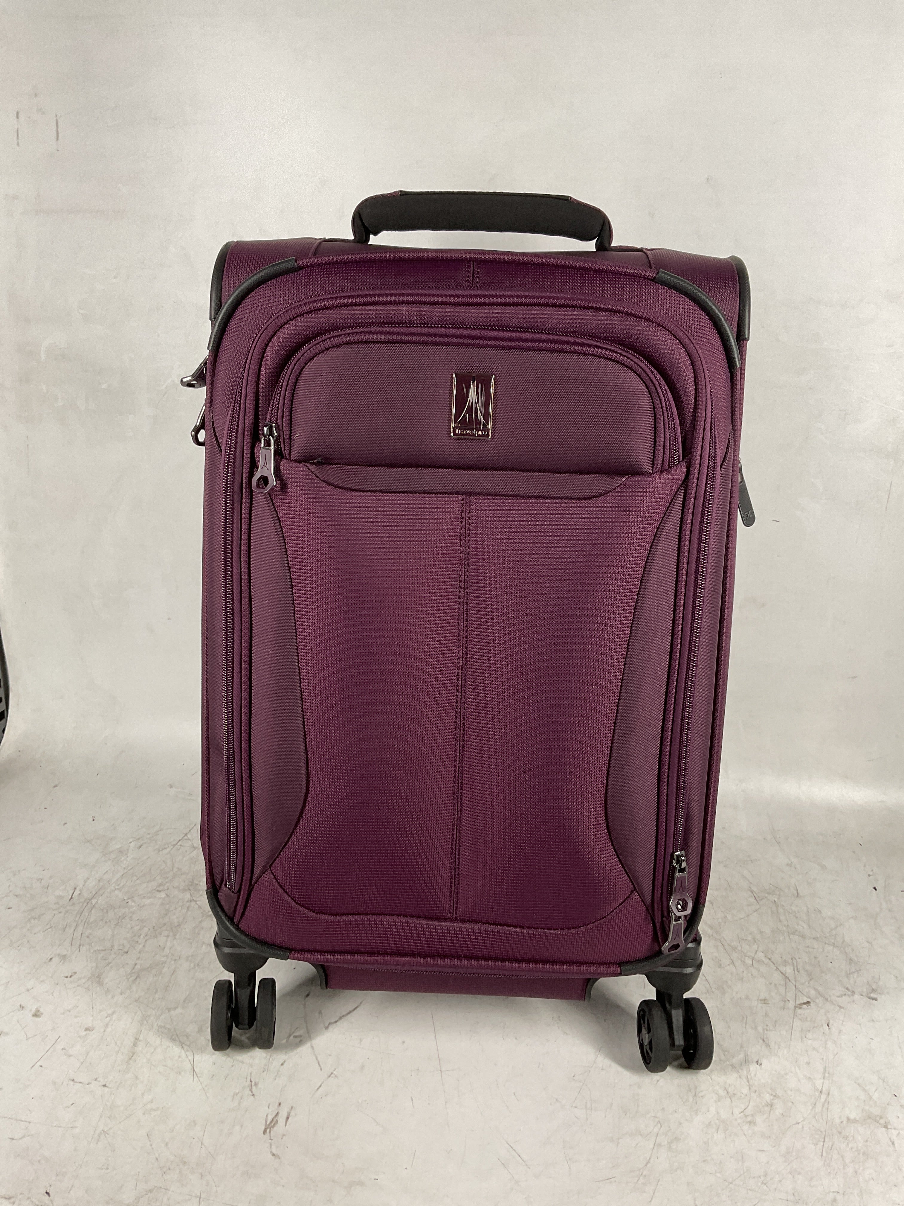 Travelpro Tourlite Softside Expandable Luggage with 4 Spinner Wheels, Lightweight Suitcase, Men and Women ( Deep Purple , Carry-On 21-Inch ) Deep Purple Carry On 21 Inch U4