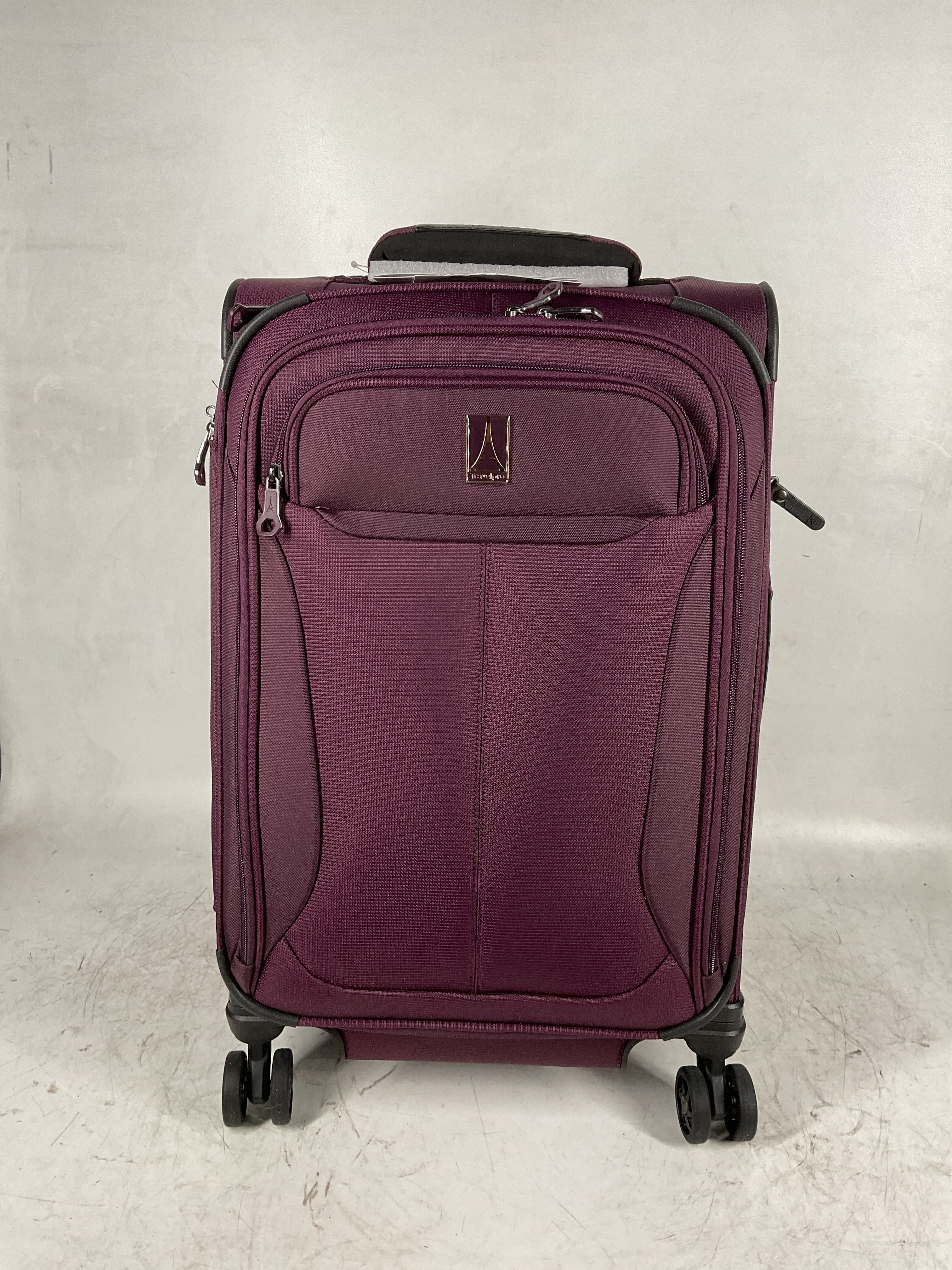 Travelpro Tourlite Softside Expandable Luggage with 4 Spinner Wheels, Lightweight Suitcase, Men and Women ( Deep Purple , Carry-On 21-Inch ) Deep Purple Carry On 21 Inch U5