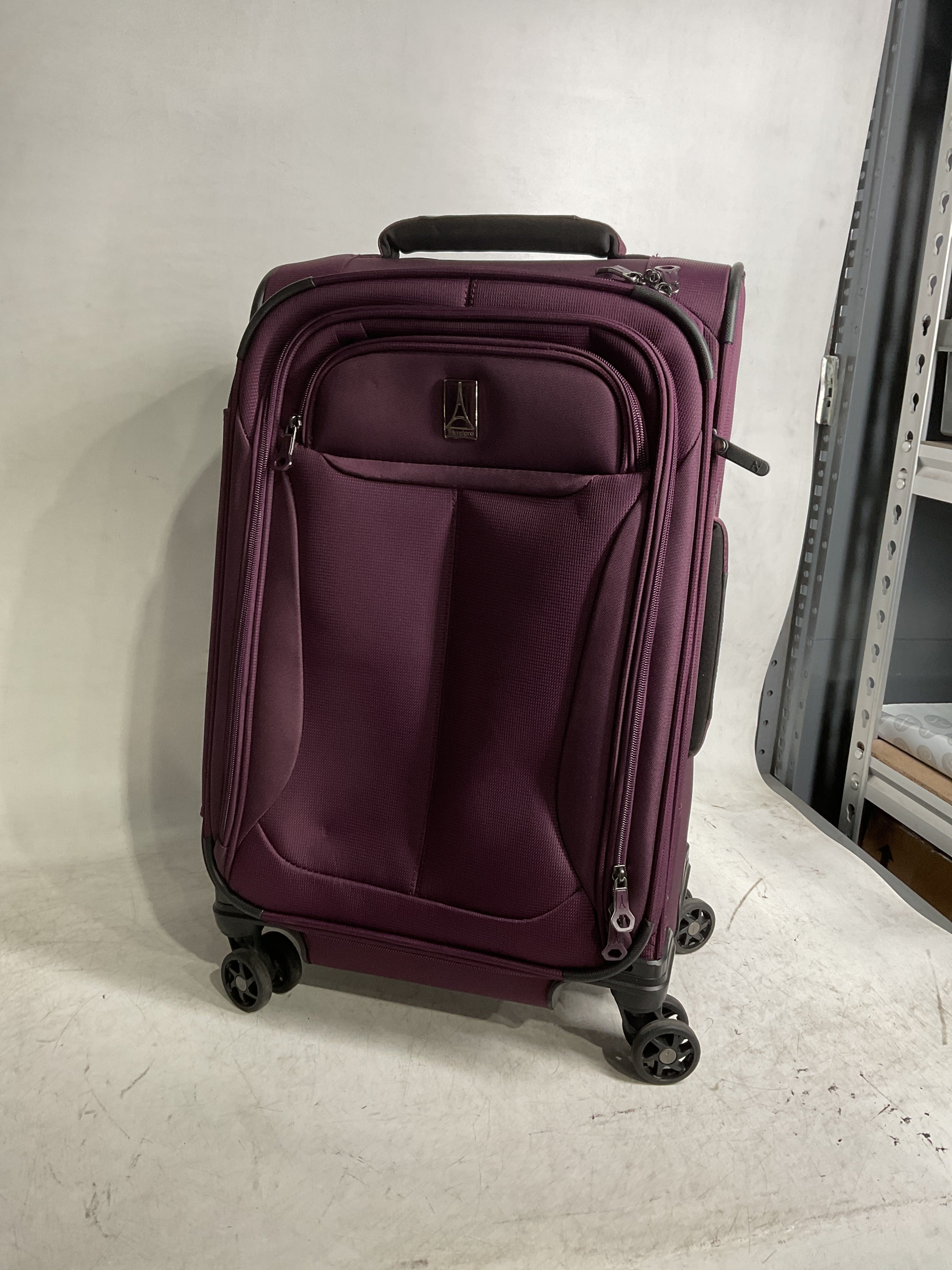 Travelpro Tourlite Softside Expandable Luggage with 4 Spinner Wheels, Lightweight Suitcase, Men and Women ( Deep Purple , Carry-On 21-Inch ) Deep Purple Carry On 21 Inch U6
