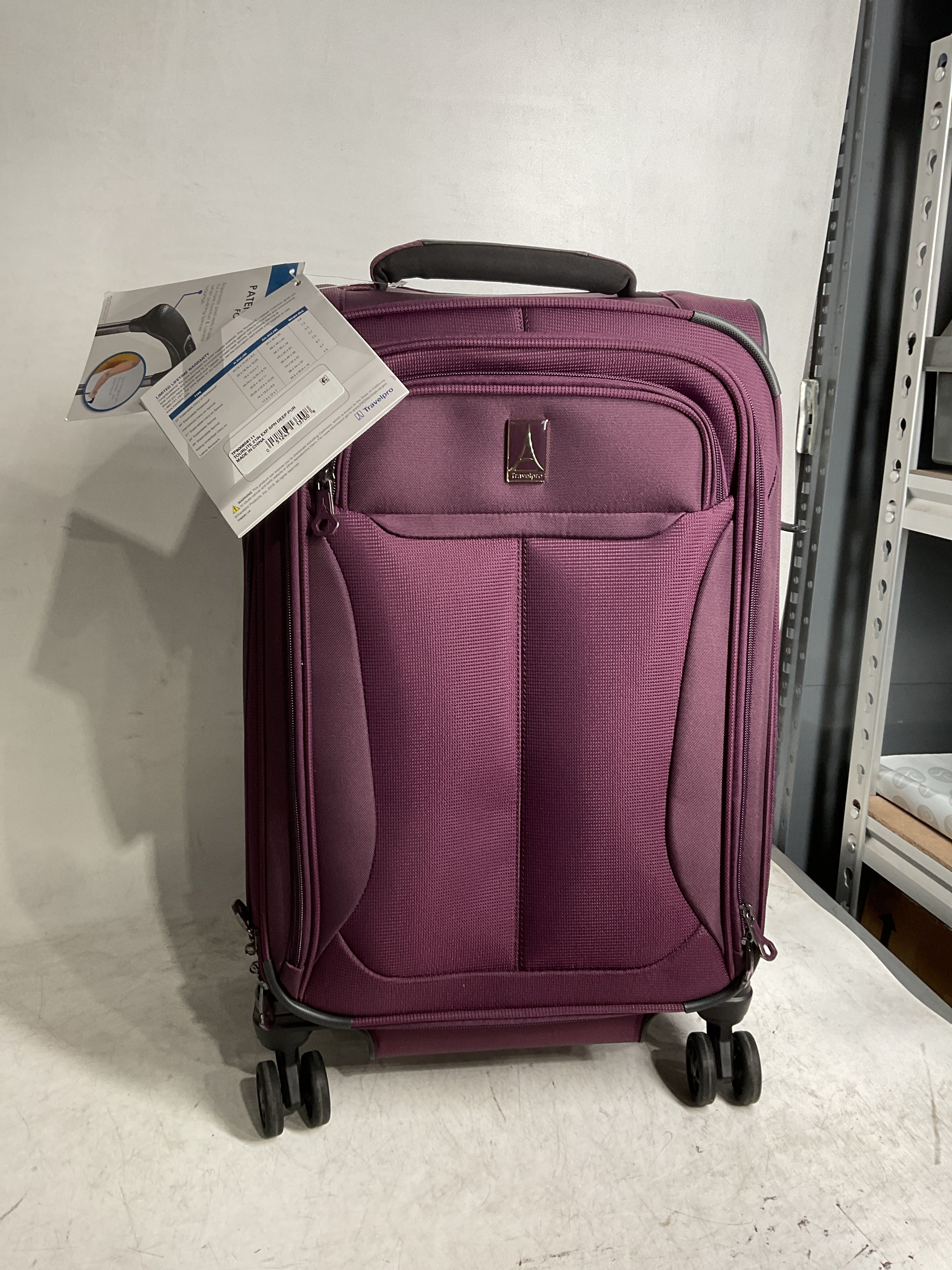 Travelpro Tourlite Softside Expandable Luggage with 4 Spinner Wheels, Lightweight Suitcase, Men and Women ( Deep Purple , Carry-On 21-Inch ) Deep Purple Carry On 21 Inch U7