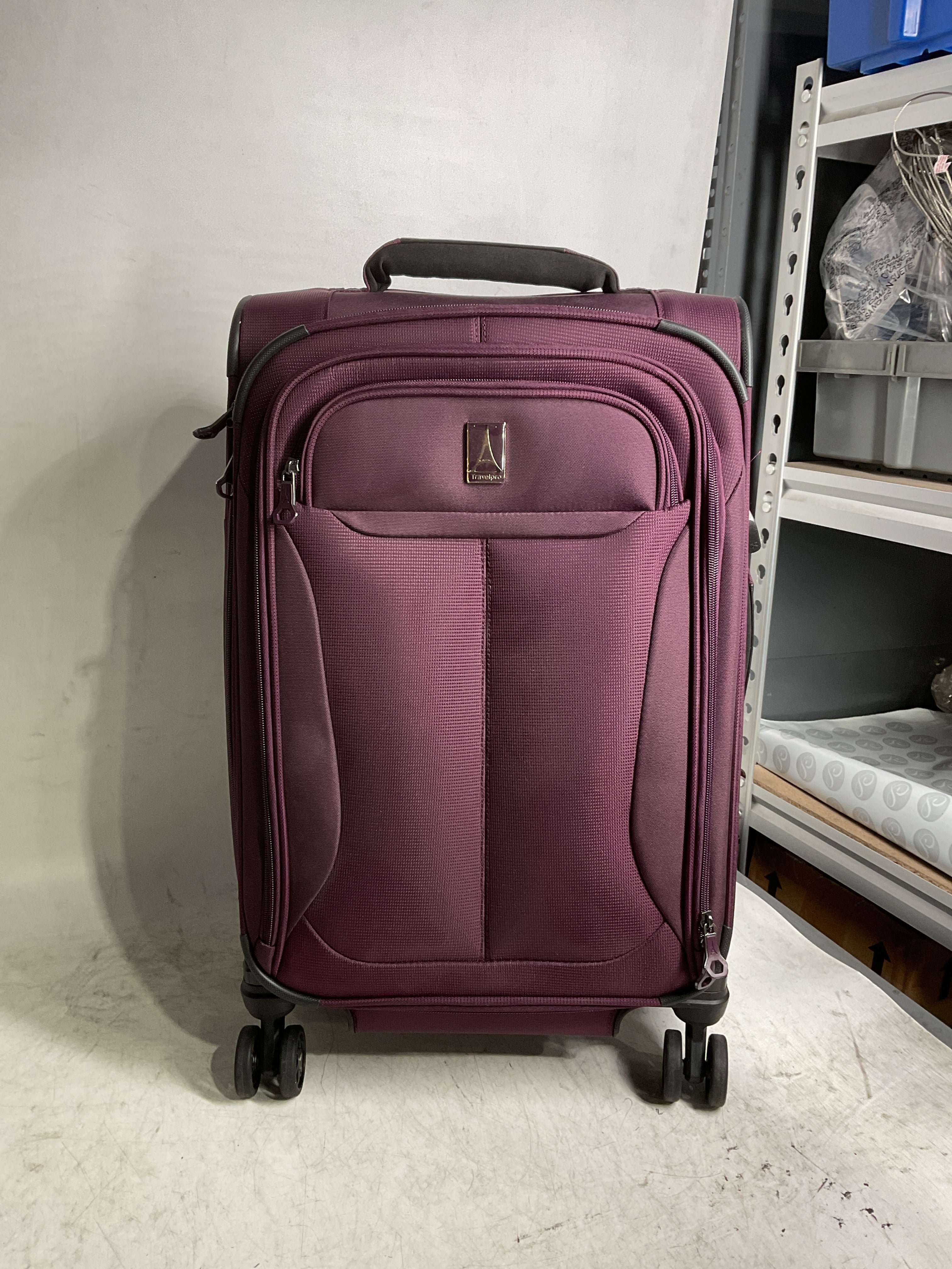 Travelpro Tourlite Softside Expandable Luggage with 4 Spinner Wheels, Lightweight Suitcase, Men and Women ( Deep Purple , Carry-On 21-Inch ) Deep Purple Carry On 21 Inch U8