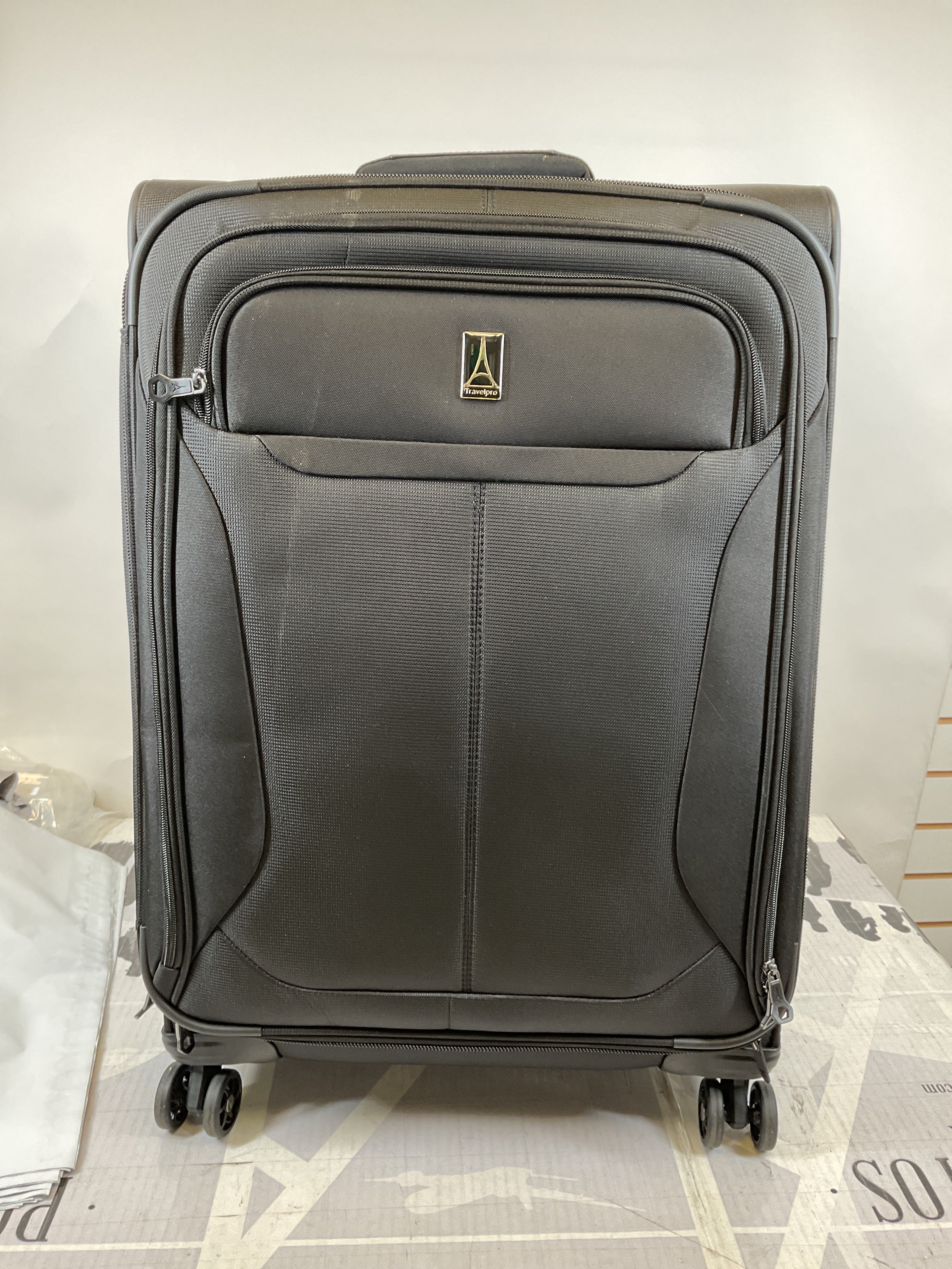 Travelpro Tourlite Softside 25" Expandable Luggage with 4 Spinner Wheels, Lightweight Suitcase, Checked Medium ( Black , Checked-Medium 25-Inch ) Black Checked Medium 25 Inch U22