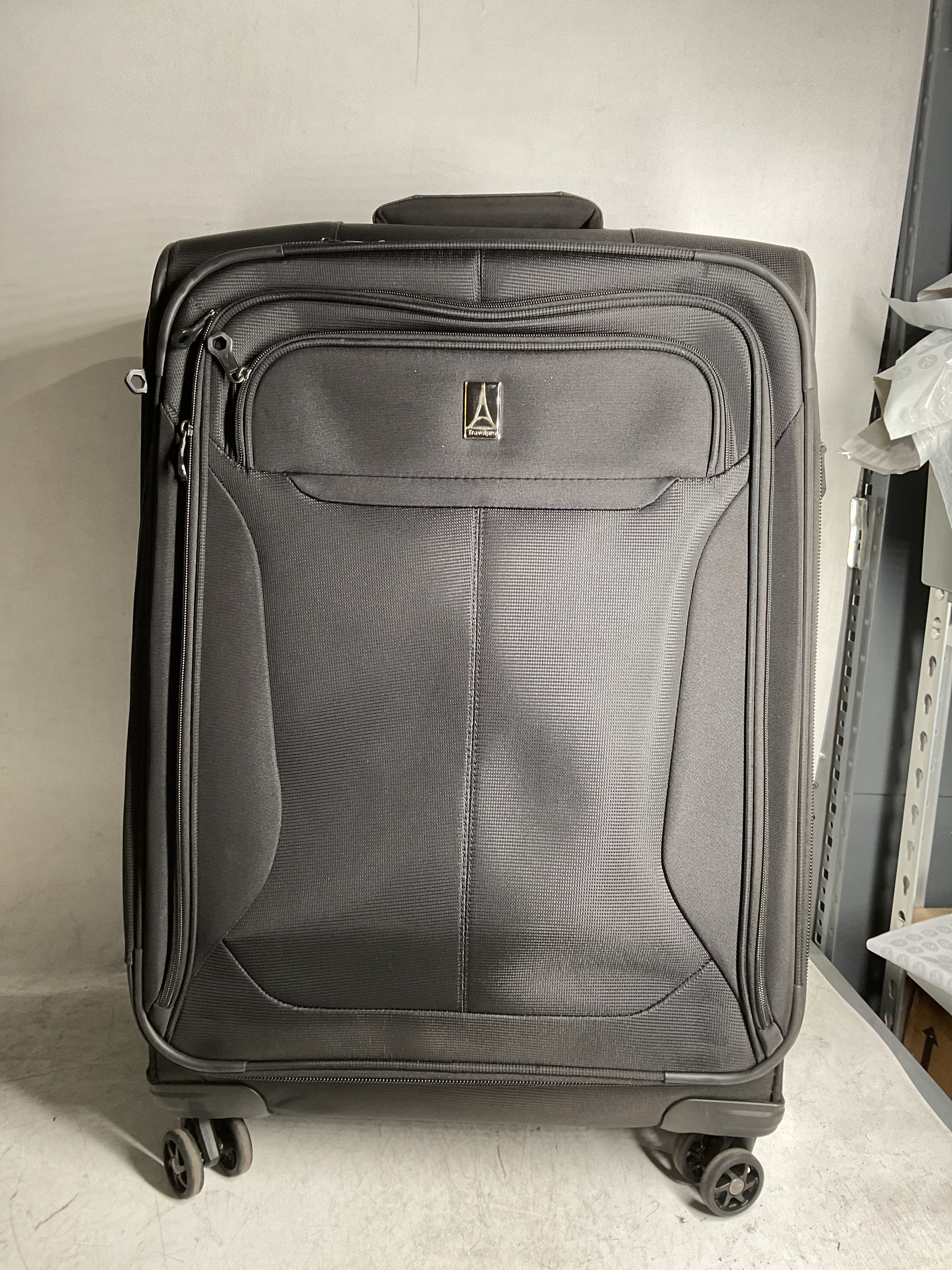 Travelpro Tourlite Softside Expandable Luggage with 4 Spinner Wheels, Lightweight Suitcase, Men and Women ( Black , Checked-Medium 25-Inch ) Black Checked Medium 25 Inch U6