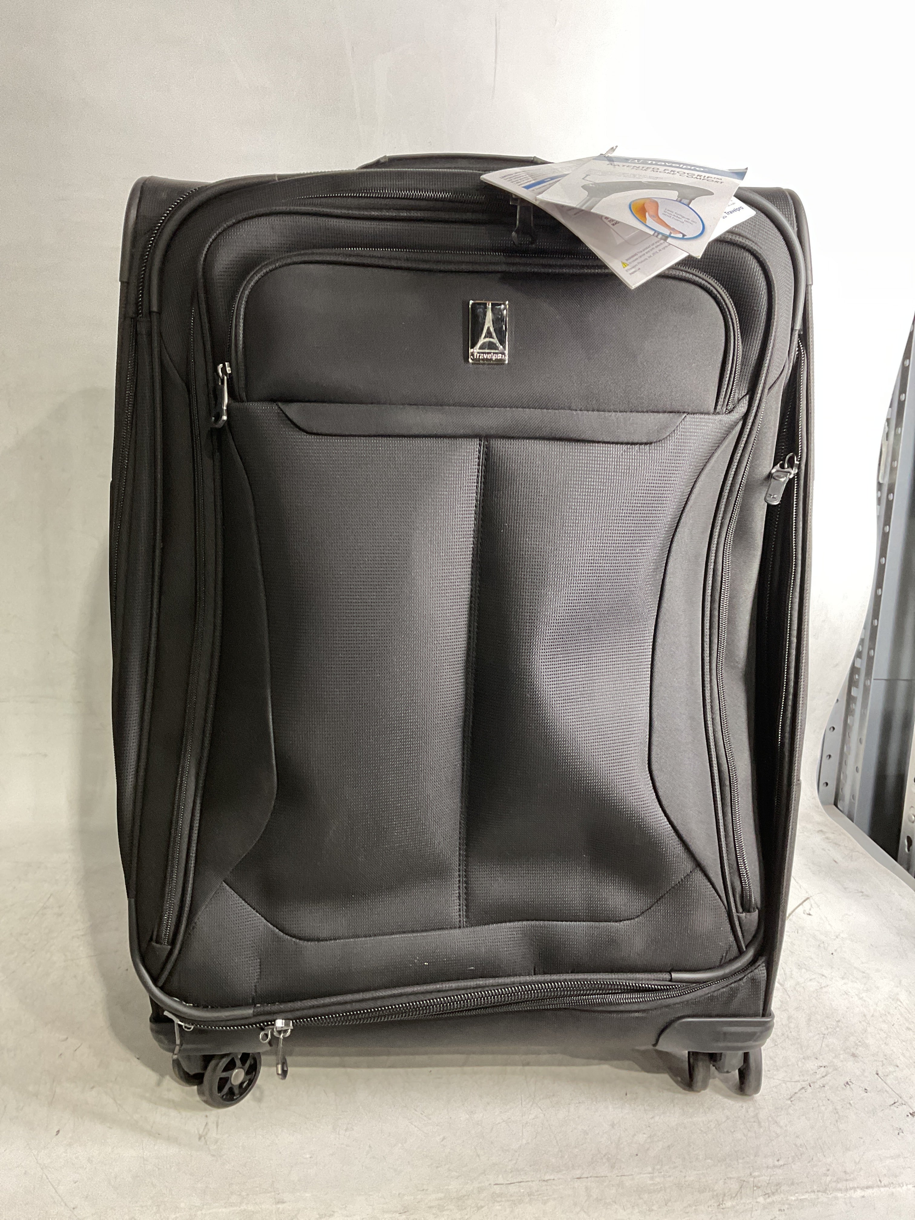 Travelpro Tourlite Softside Expandable Luggage with 4 Spinner Wheels, Lightweight Suitcase, Men and Women ( Black , Checked-Medium 25-Inch ) Black Checked Medium 25 Inch U8