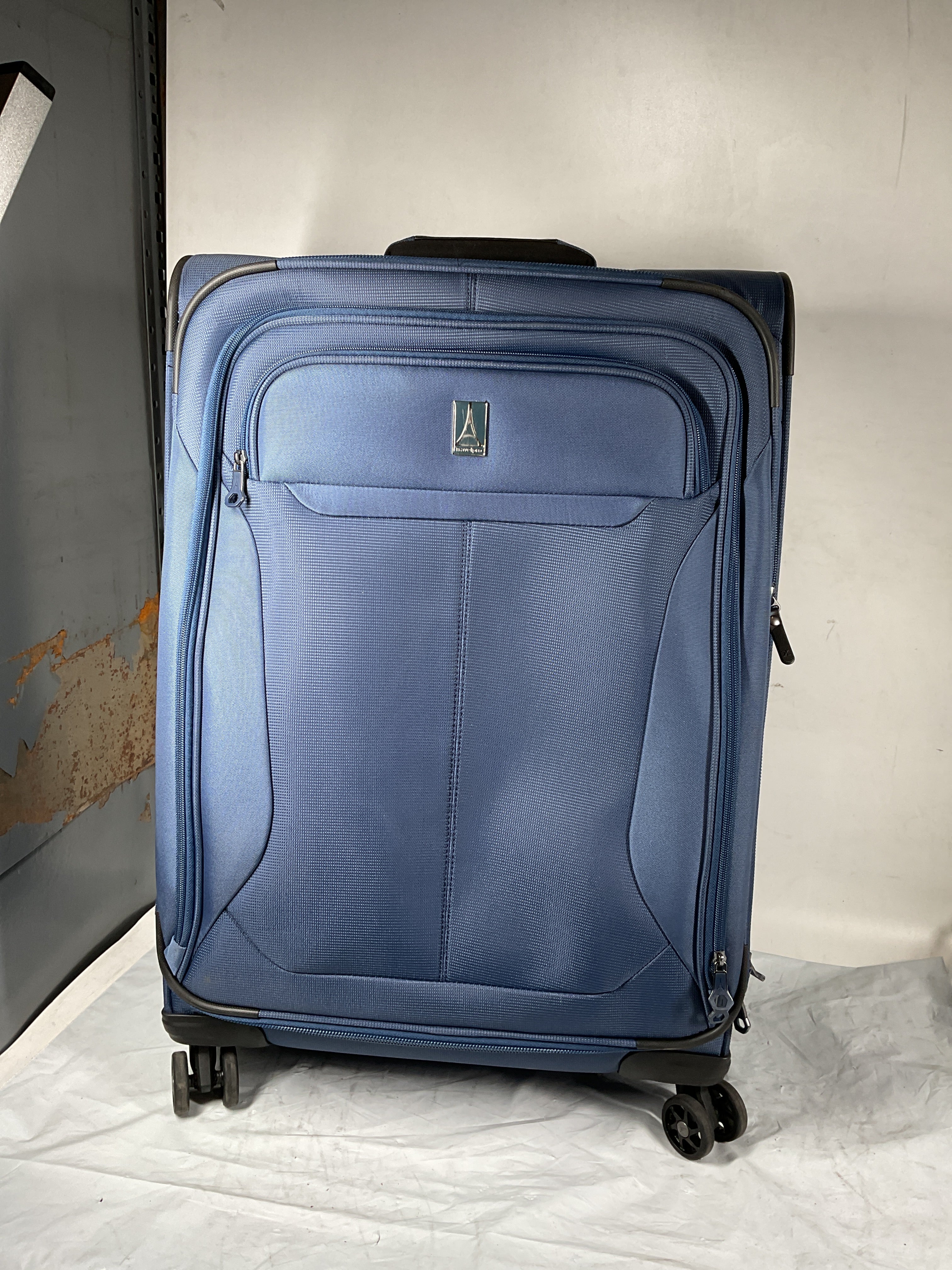 Travelpro Tourlite Softside 25" Expandable Luggage with 4 Spinner Wheels, Lightweight Suitcase, Checked Medium ( Blue , Checked-Medium 25-Inch ) Blue Checked Medium 25 Inch U17