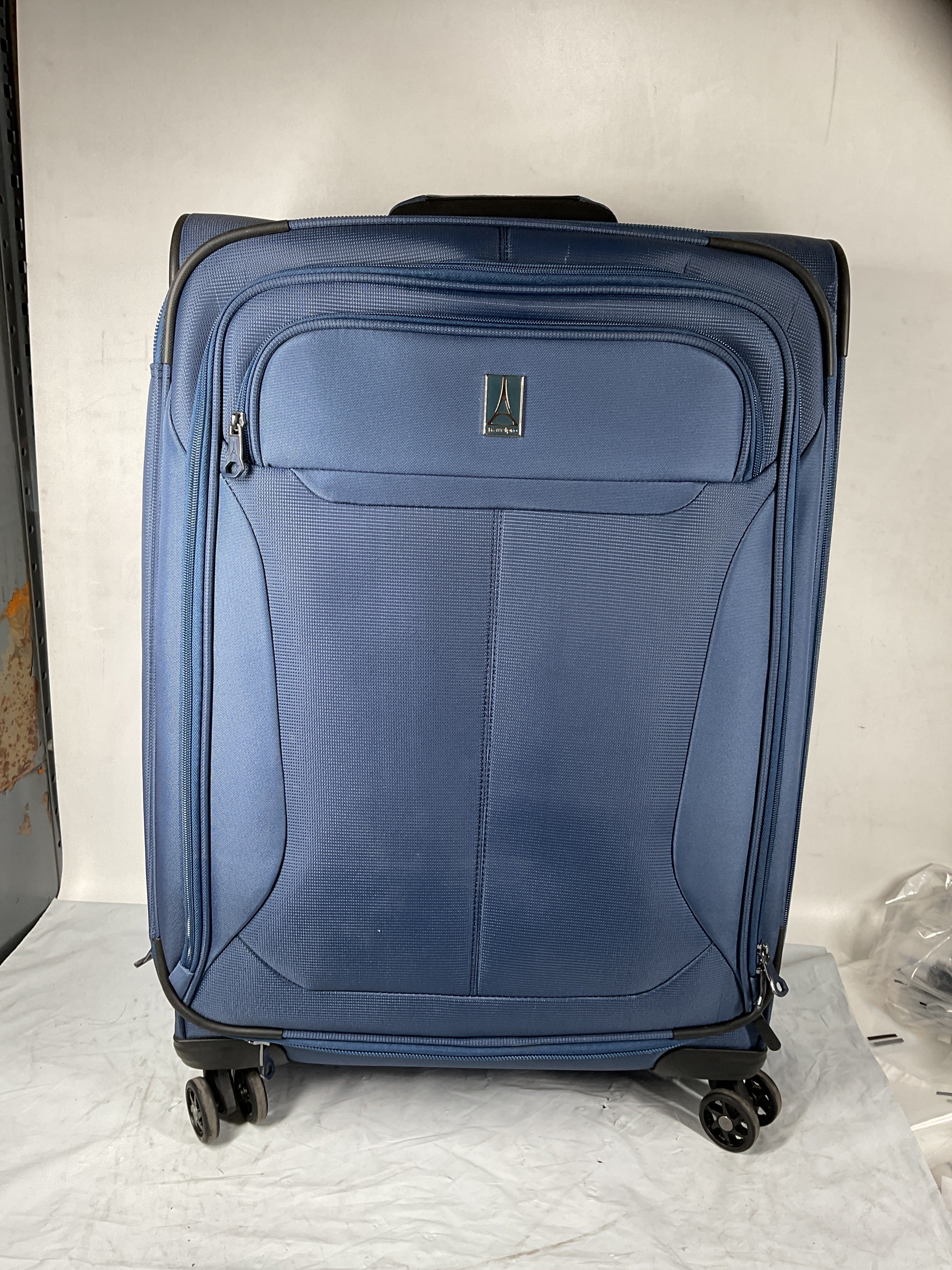 Travelpro Tourlite Softside 25" Expandable Luggage with 4 Spinner Wheels, Lightweight Suitcase, Checked Medium ( Blue , Checked-Medium 25-Inch ) Blue Checked Medium 25 Inch U19