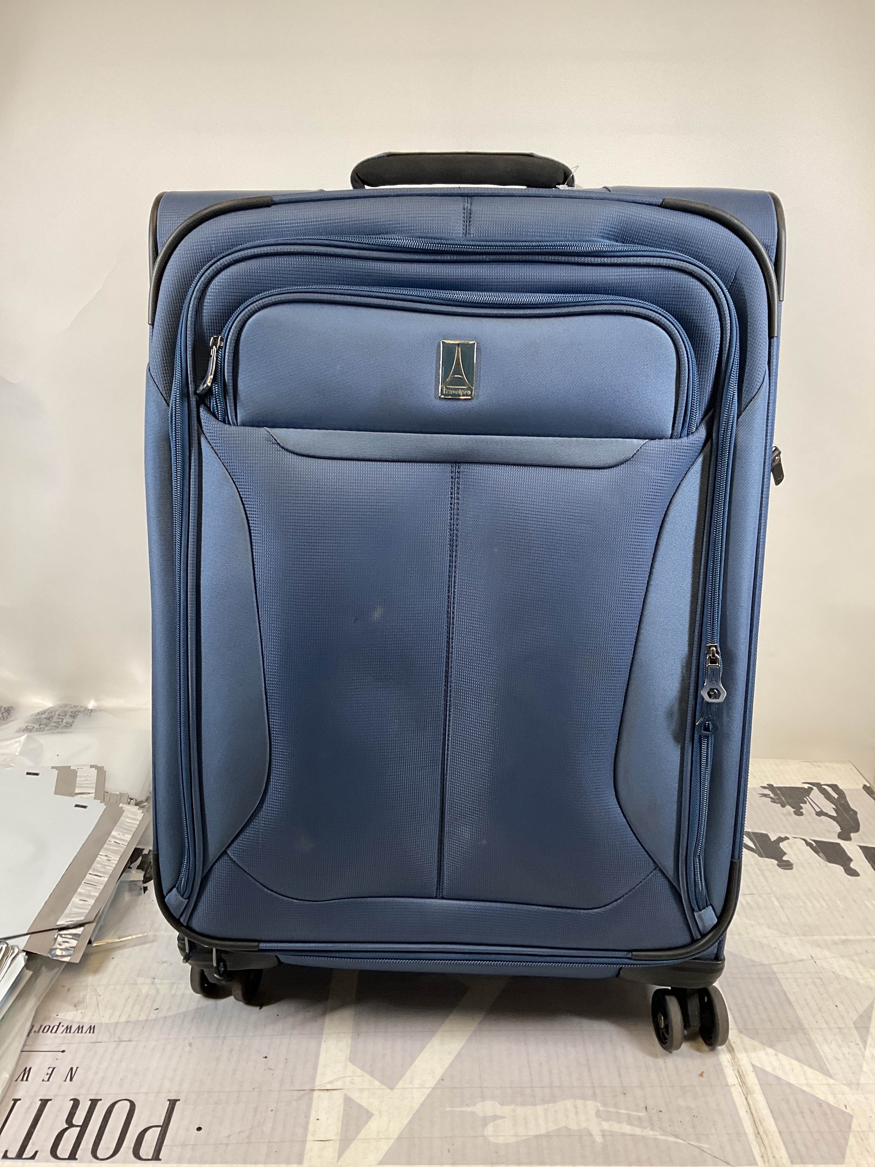 Travelpro Tourlite Softside 25" Expandable Luggage with 4 Spinner Wheels, Lightweight Suitcase, Checked Medium ( Blue , Checked-Medium 25-Inch ) Blue Checked Medium 25 Inch U21