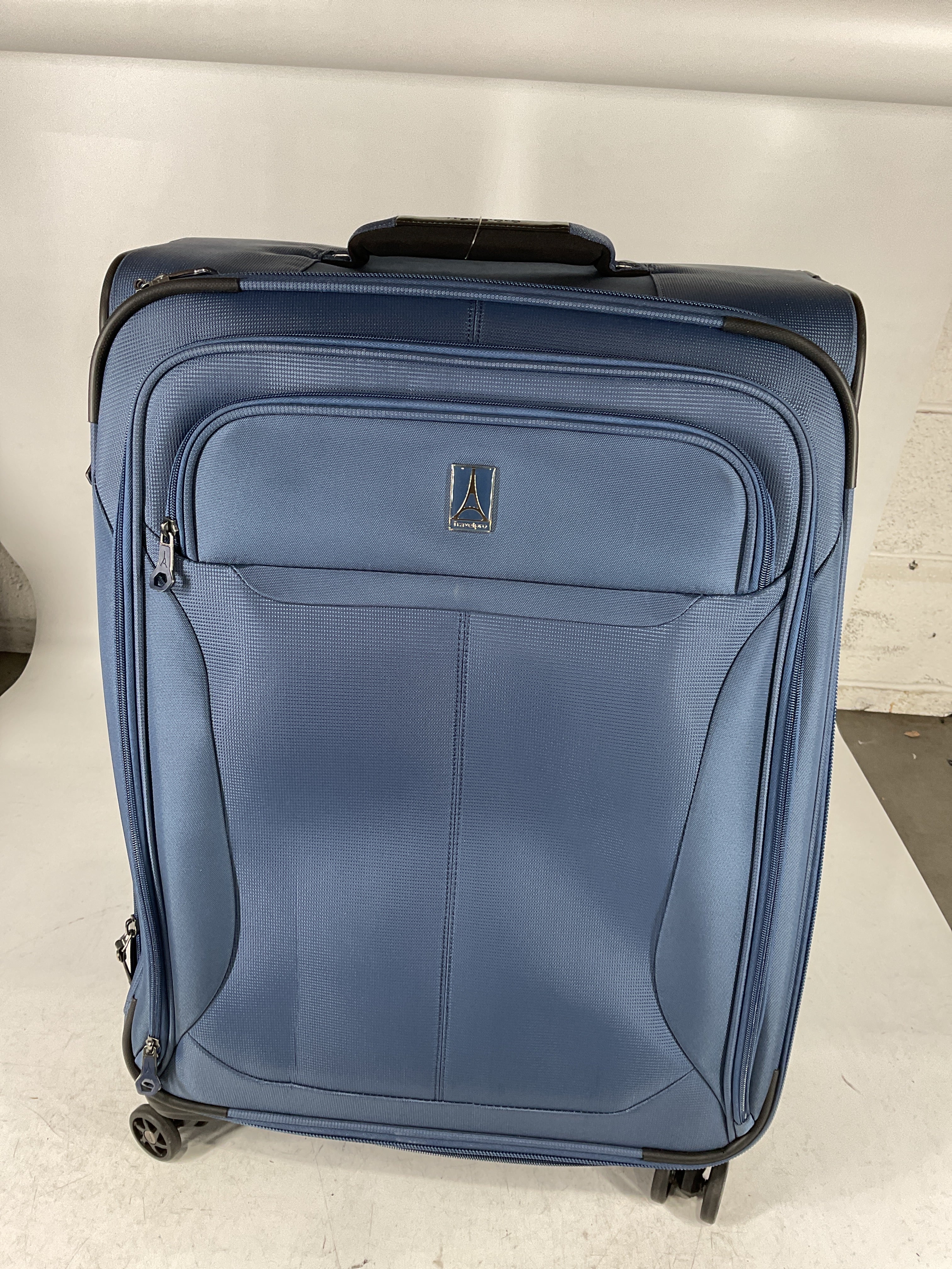 Travelpro Tourlite Softside Expandable Luggage with 4 Spinner Wheels, Lightweight Suitcase, Men and Women U3