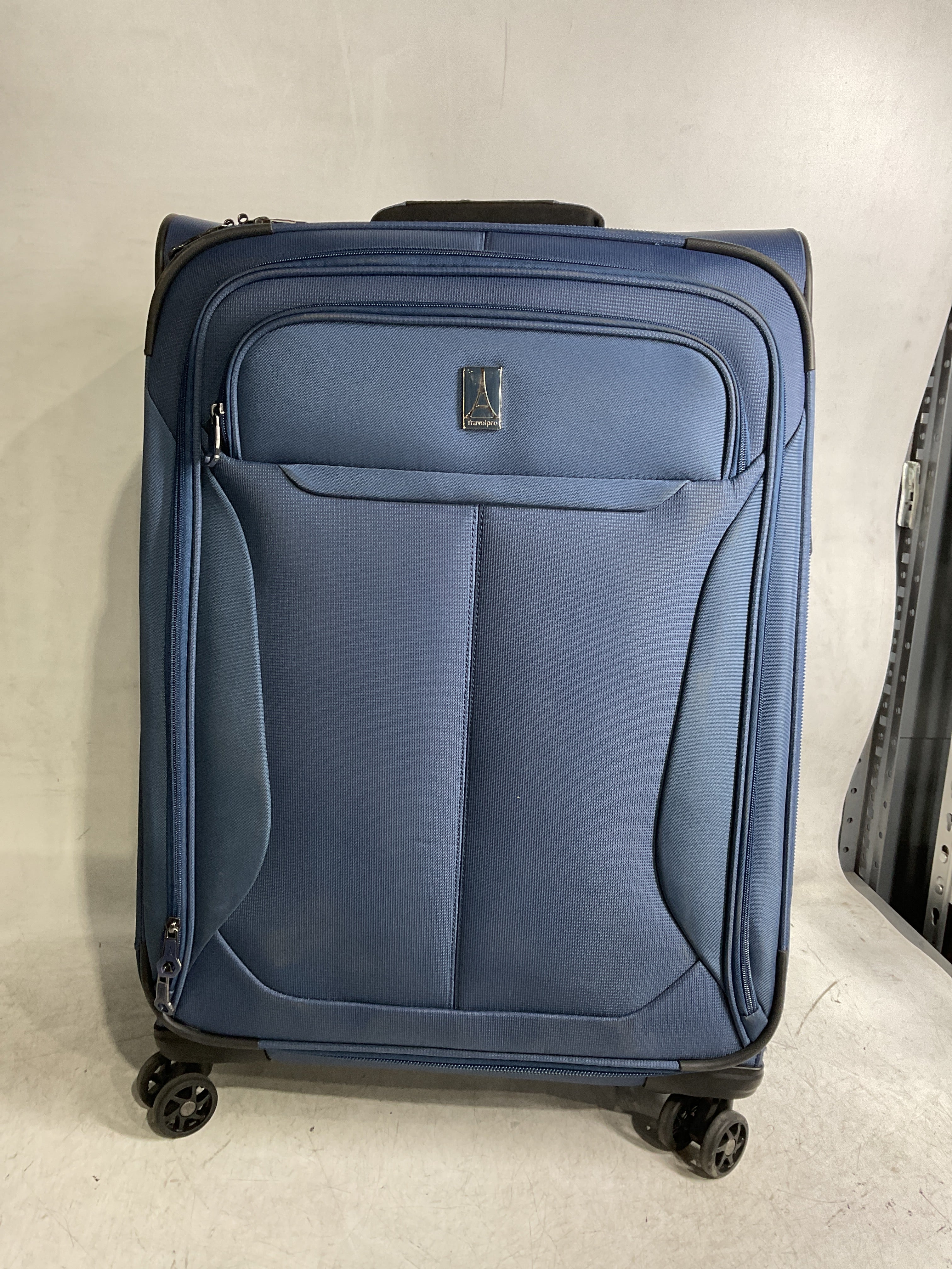Travelpro Tourlite Softside Expandable Luggage with 4 Spinner Wheels, Lightweight Suitcase, Men and Women ( Blue , Checked-Medium 25-Inch ) Blue Checked Medium 25 Inch U8