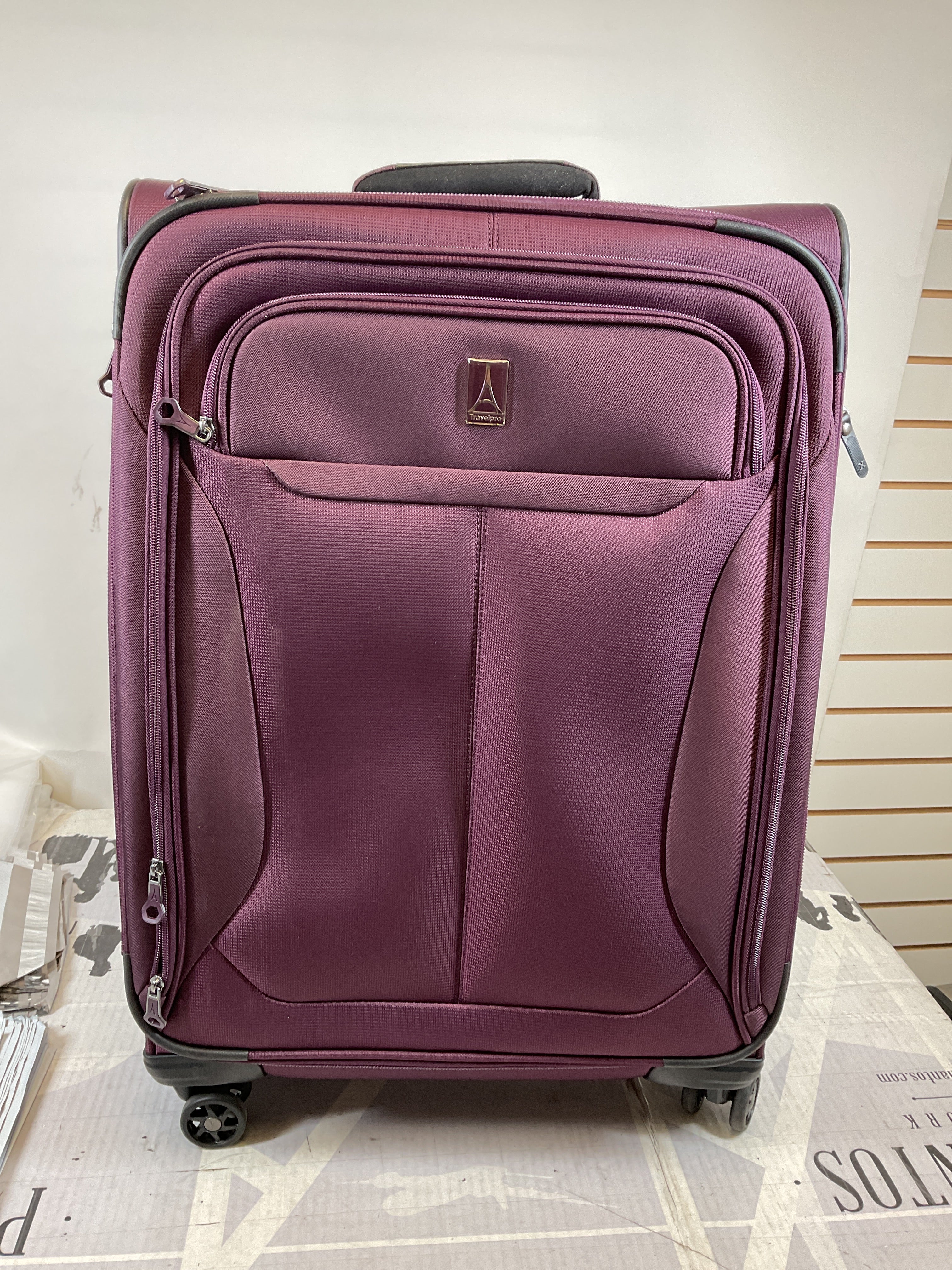 Travelpro Tourlite Softside 25" Expandable Luggage with 4 Spinner Wheels, Lightweight Suitcase, Checked Medium ( Deep Purple , Checked-Medium 25-Inch ) Deep Purple Checked Medium 25 Inch U10